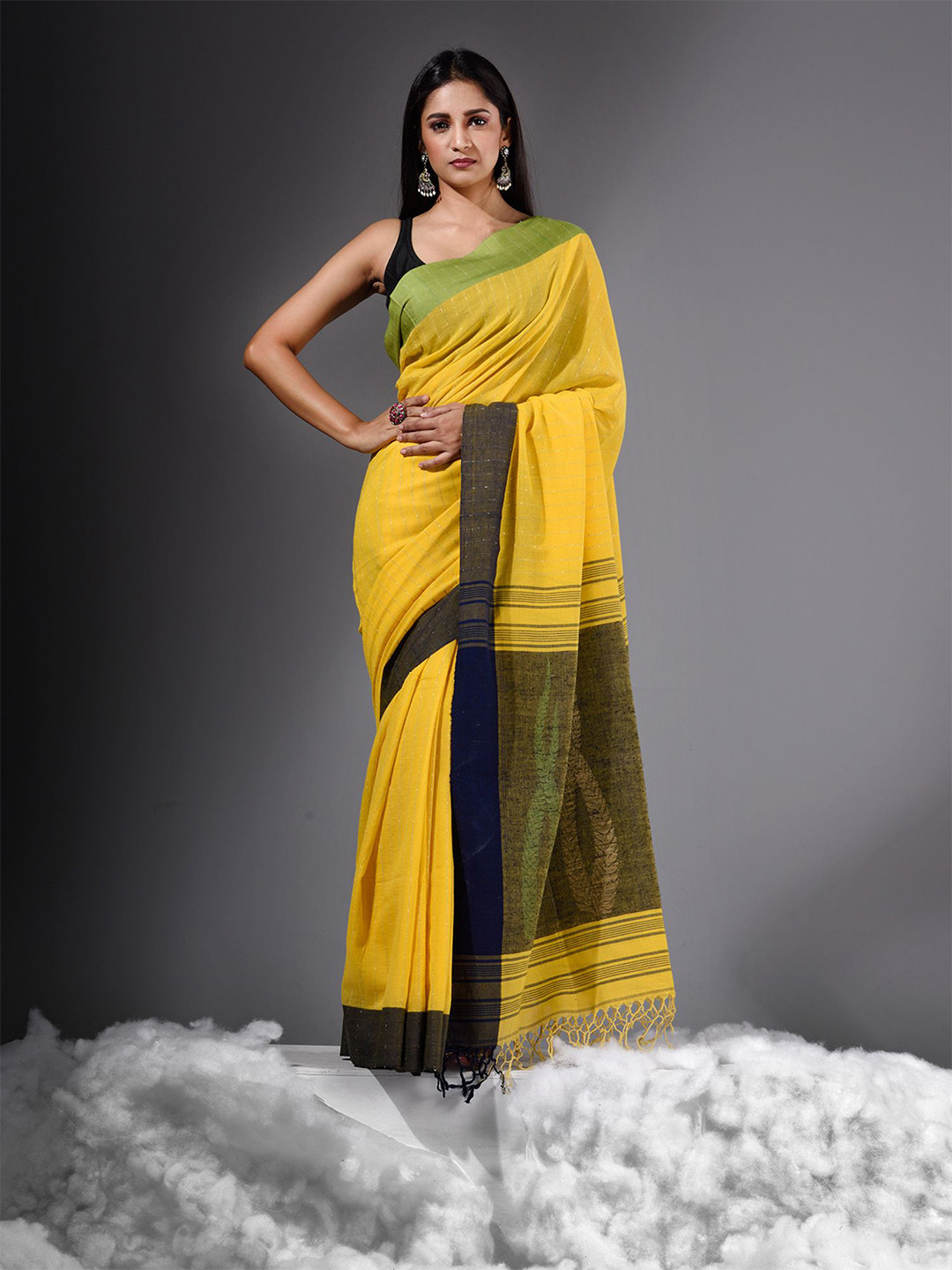

Charukriti Yellow, Green & Black Ethnic Motifs Pure Cotton Khadi Saree