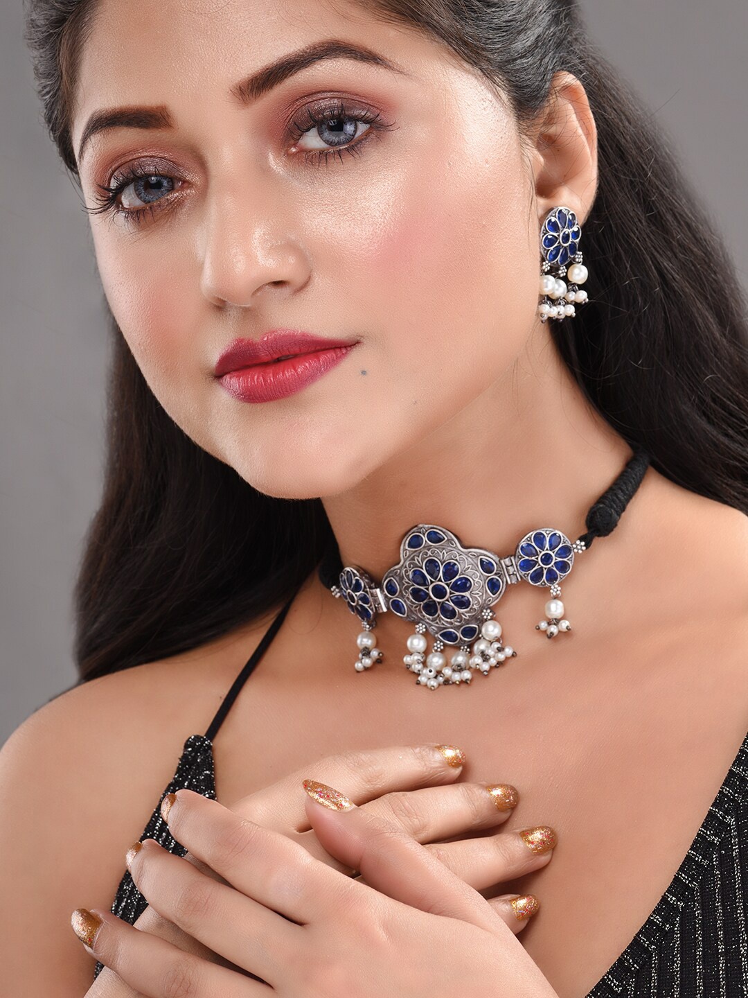 

Saraf RS Jewellery Silver-Plated & Blue Stone-Studded Jewellery Set