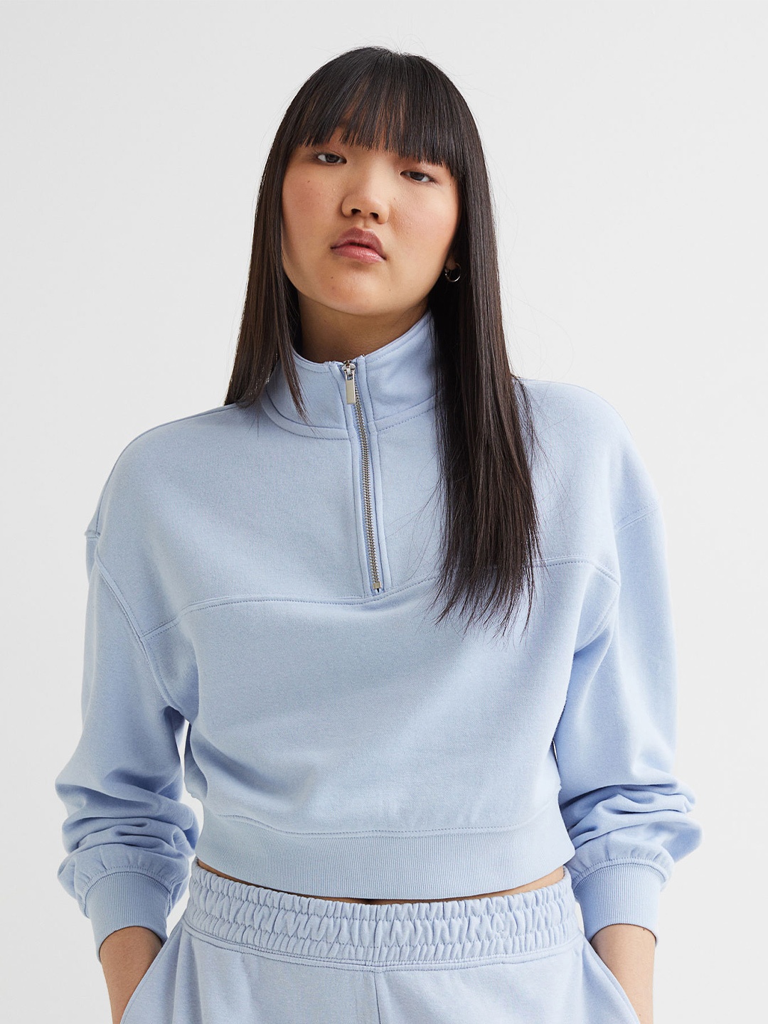

H&M Women Blue Solid Zip-Top Sweatshirt