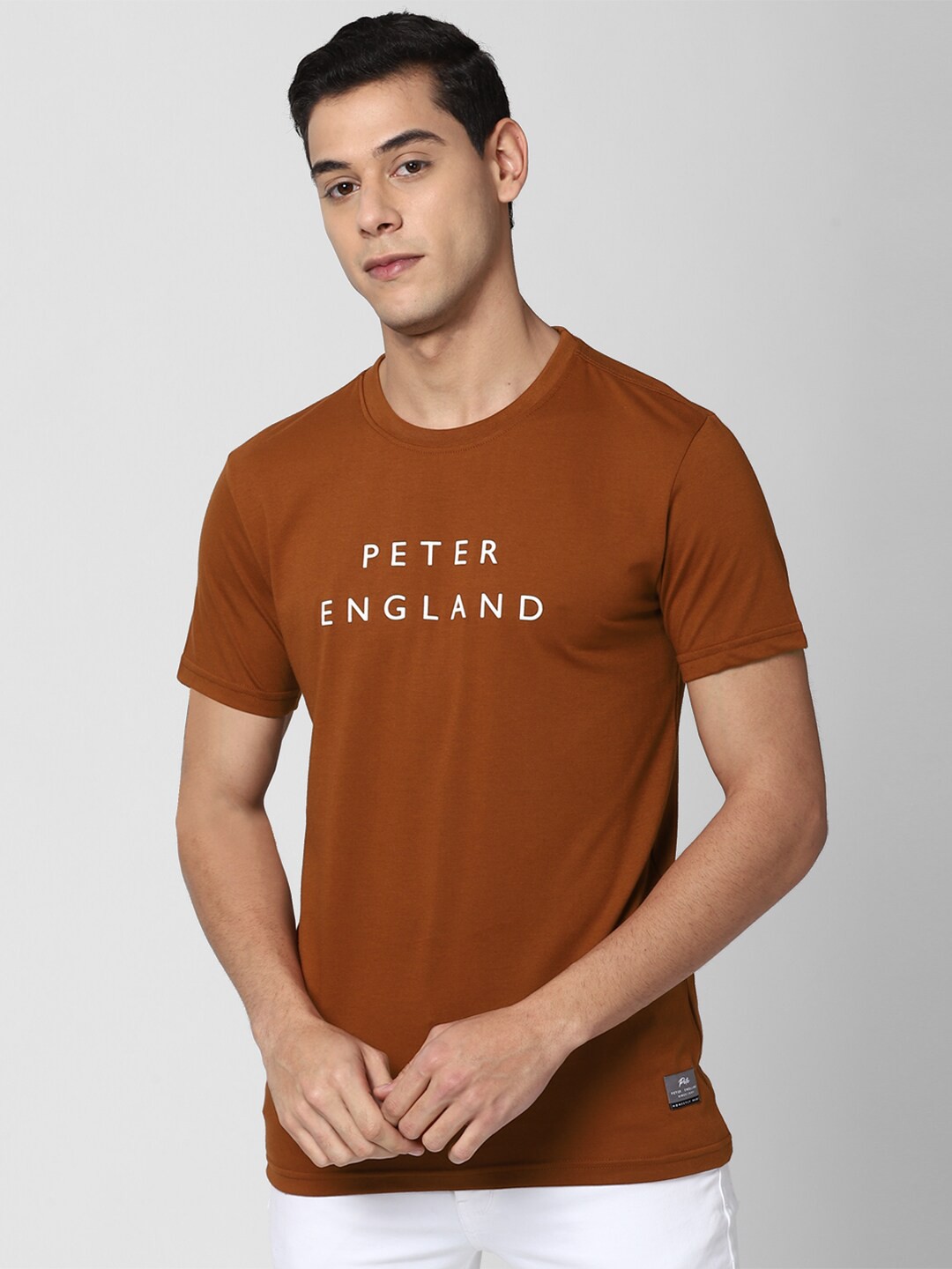 

Peter England Casuals Men Orange Typography Printed Slim Fit T-shirt