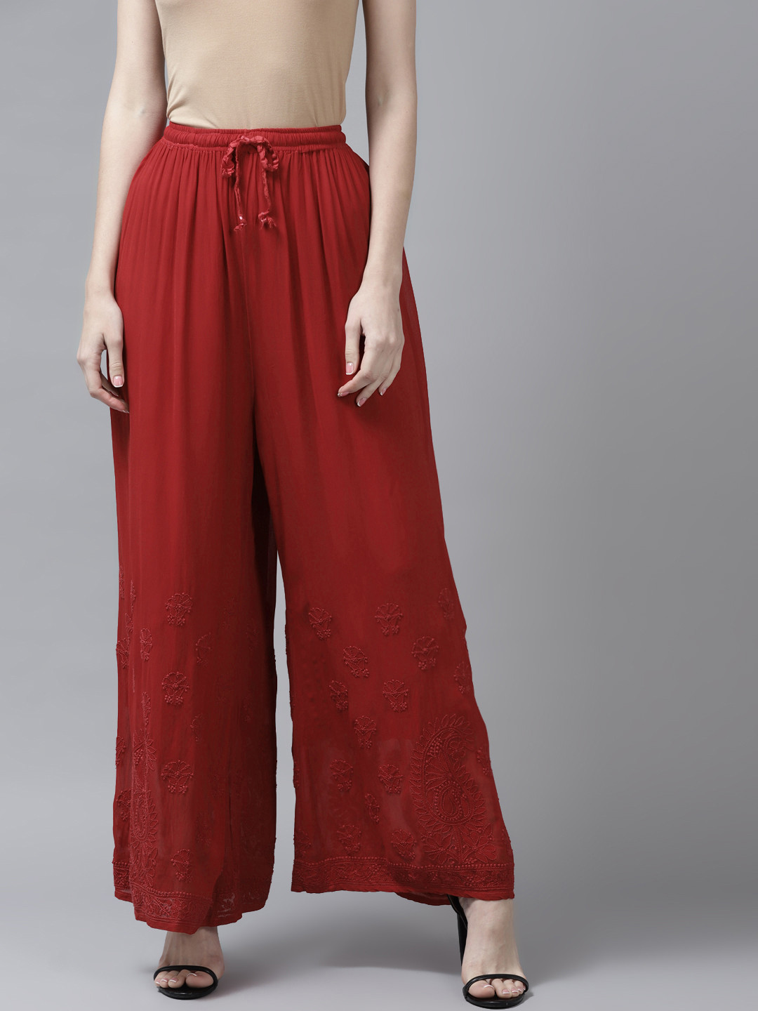 

ADA Women Red Ethnic Motifs Embroidered Flared Handloom Georgette Ethnic Handloom Palazzos
