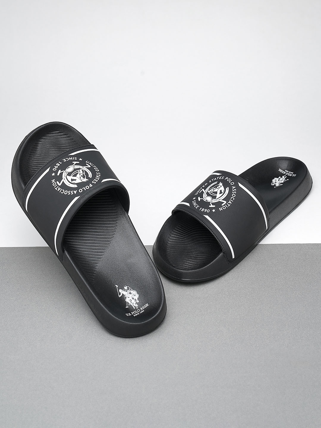 

U.S. Polo Assn. Men Black Brand Logo Printed Zane 4.0 Sliders with Textured Detail