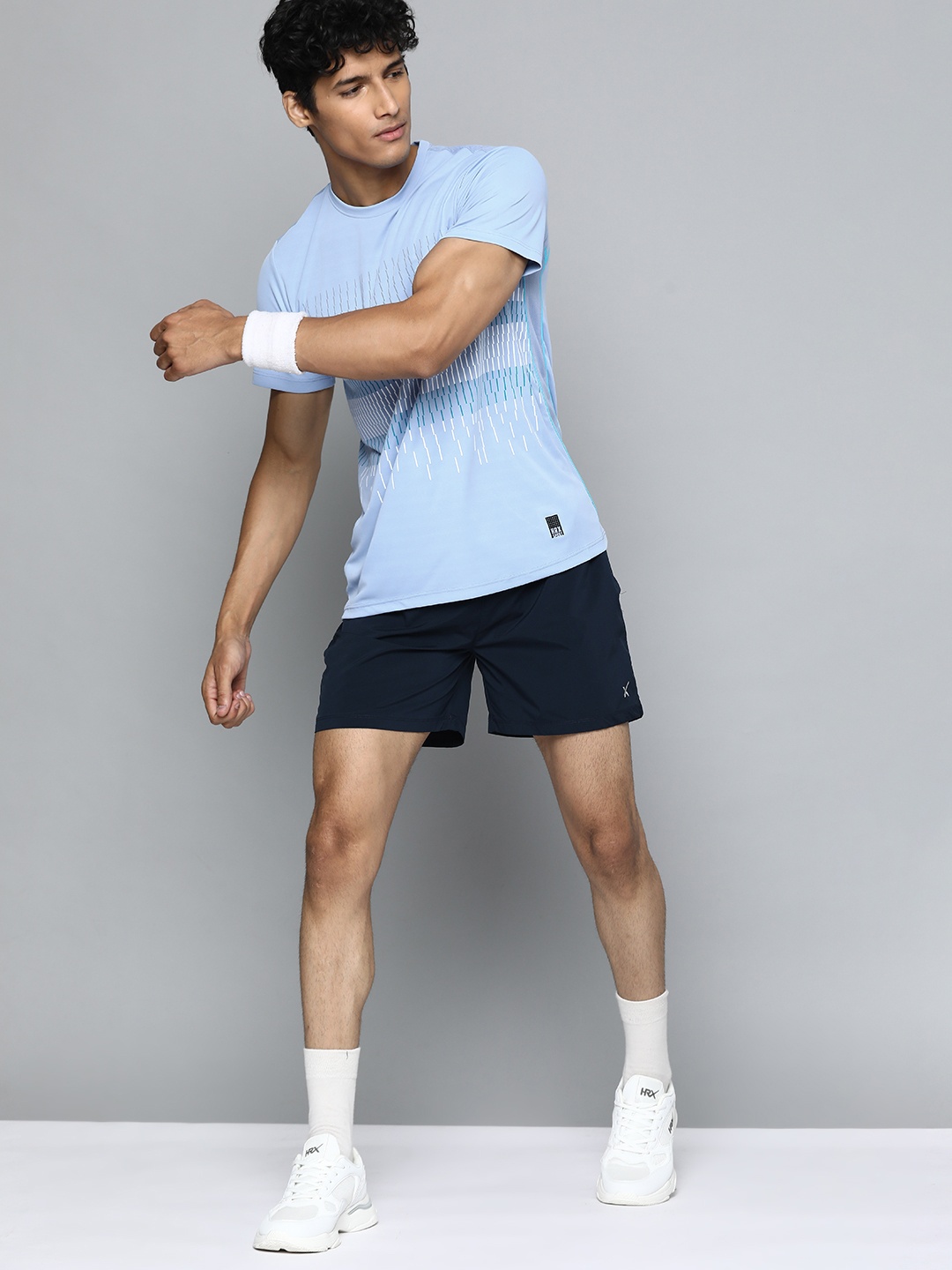 

HRX By Hrithik Roshan Racketsport Men Blue Fod Rapid-Dry Geometric Tshirt