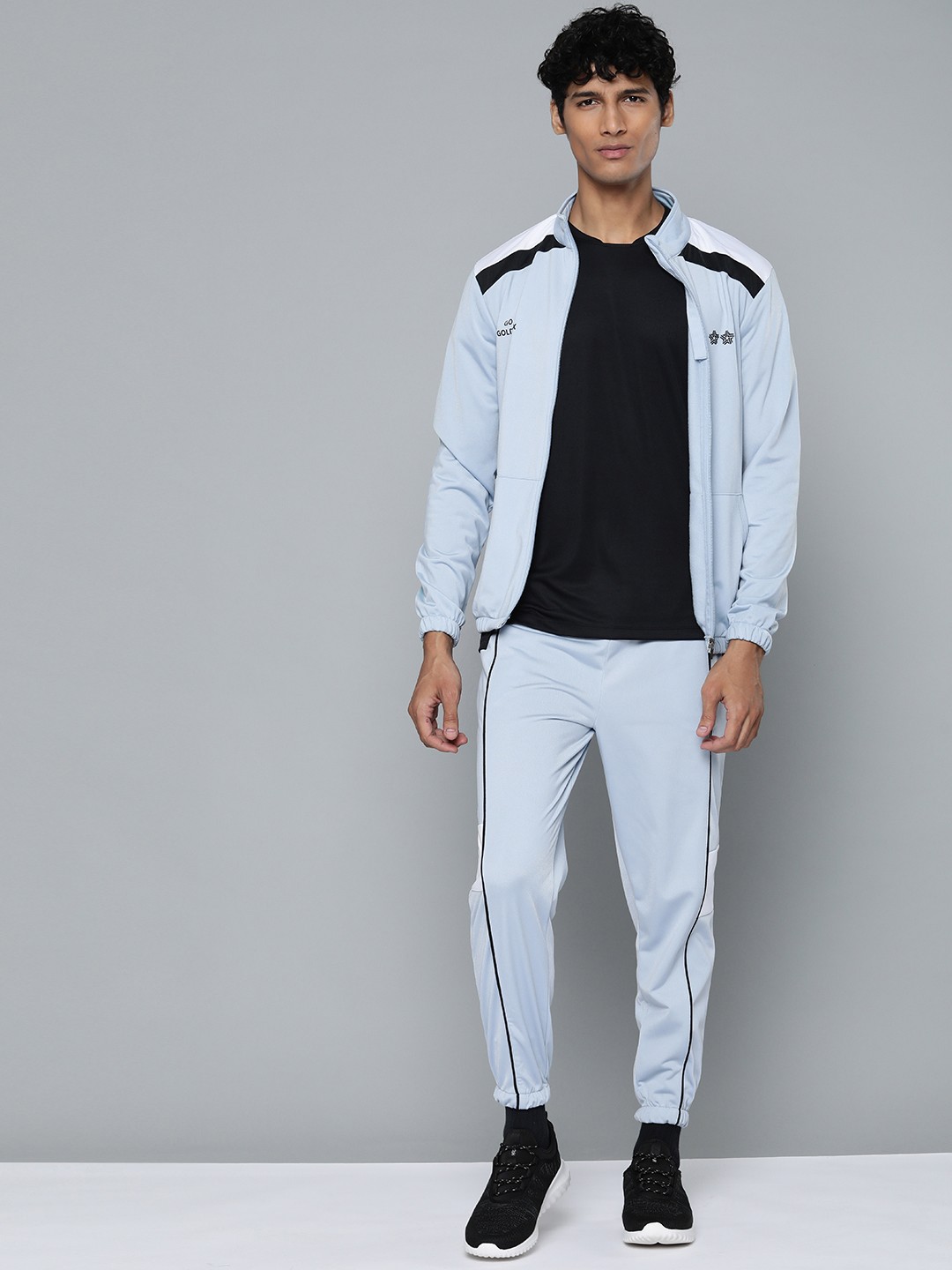 

HRX By Hrithik Roshan Basketball Men Blue Fog Colourblock Tracksuits