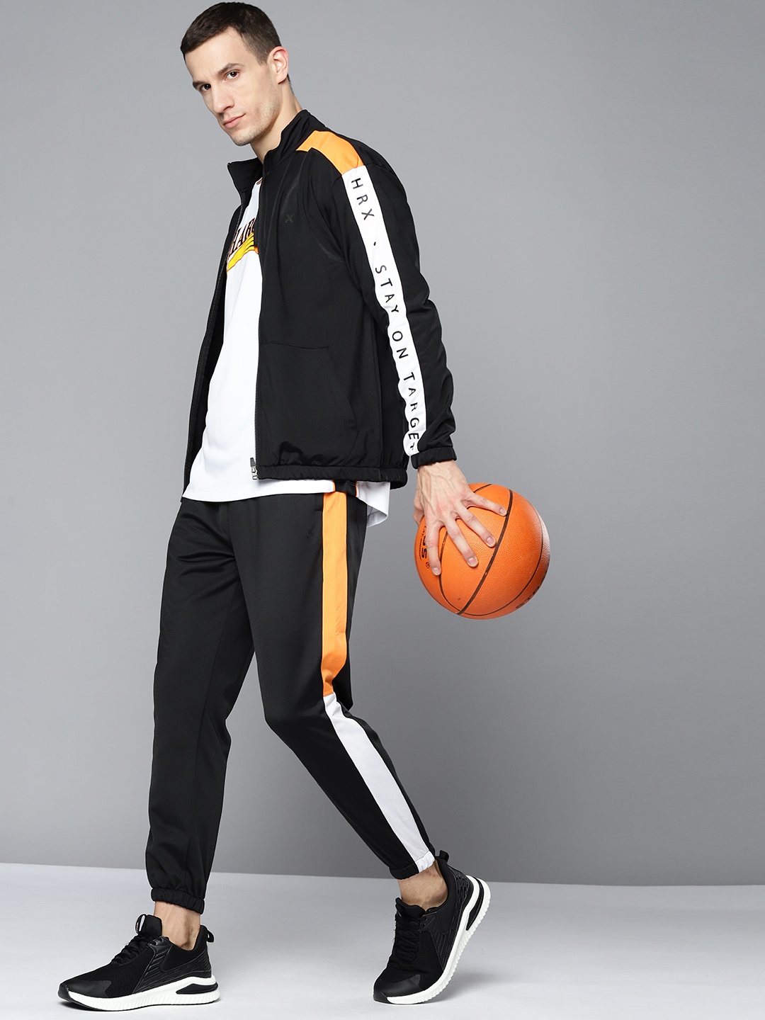 

HRX By Hrithik Roshan Basketball Men Jet Black Colourblock Tracksuits