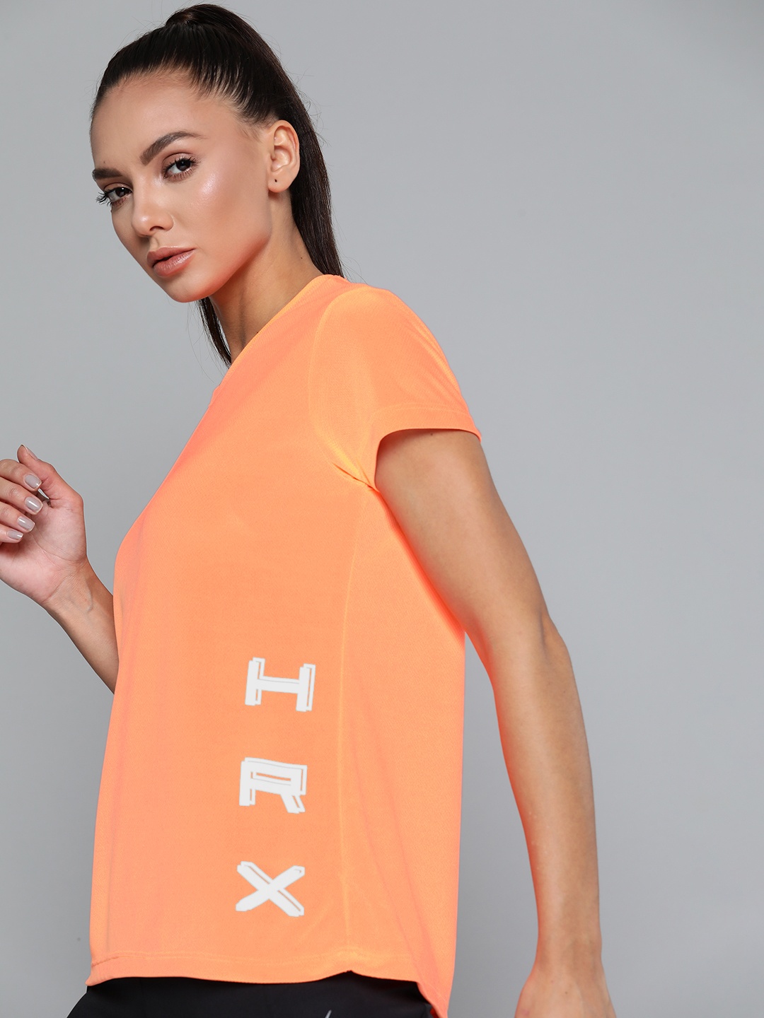 

HRX By Hrithik Roshan Running Women Neon Orange Rapid-Dry Brand Carrier Tshirts