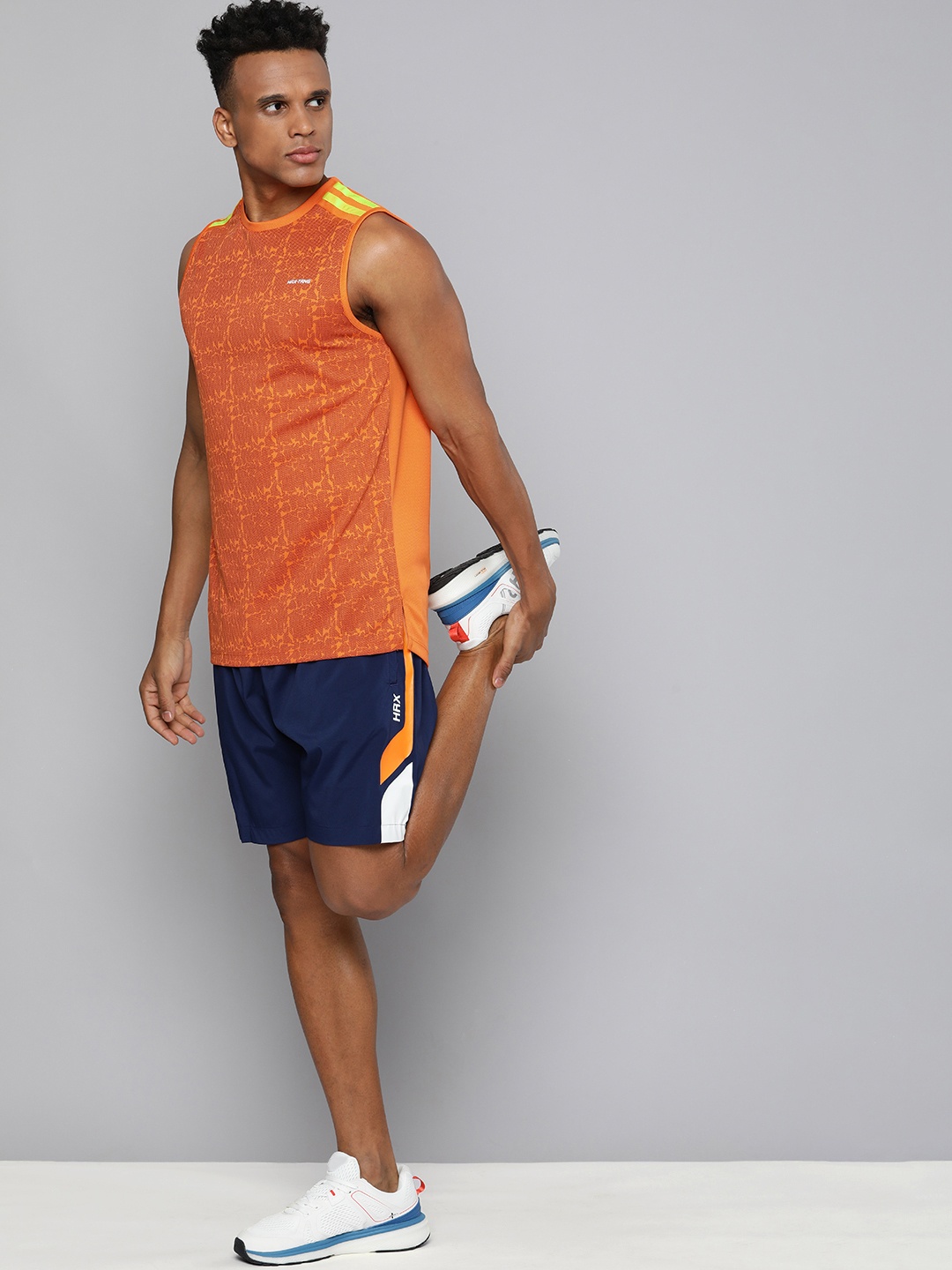 

HRX By Hrithik Roshan Training Men Orange Rapid-Dry Brand Carrier Tshirts