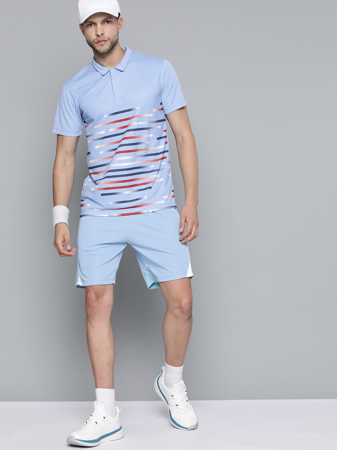 

HRX By Hrithik Roshan Racketsport Men Blue Fod Rapid-Dry Abstract Tshirts