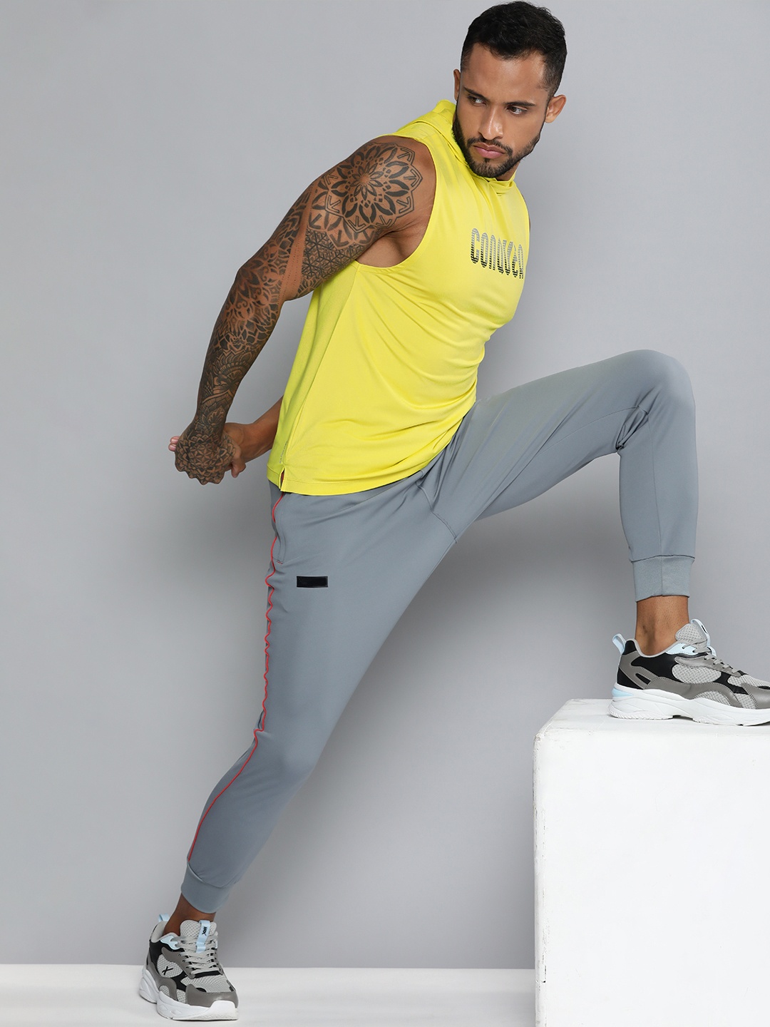 

HRX By Hrithik Roshan Training Men Neon Lime Rapid-Dry Typography T-shirt, Yellow