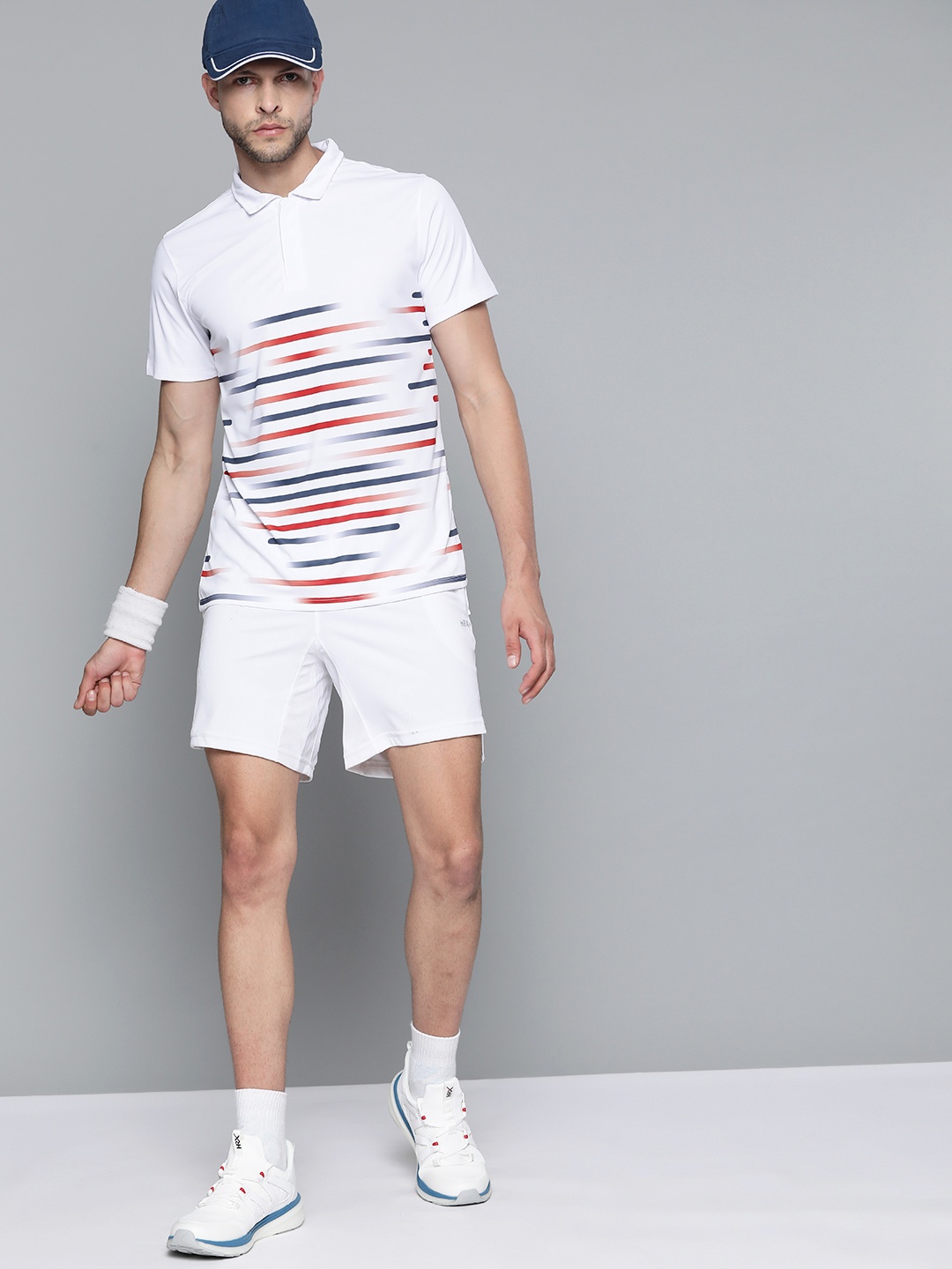 

HRX By Hrithik Roshan Racketsport Men Optic White Rapid-Dry Abstract Tshirts