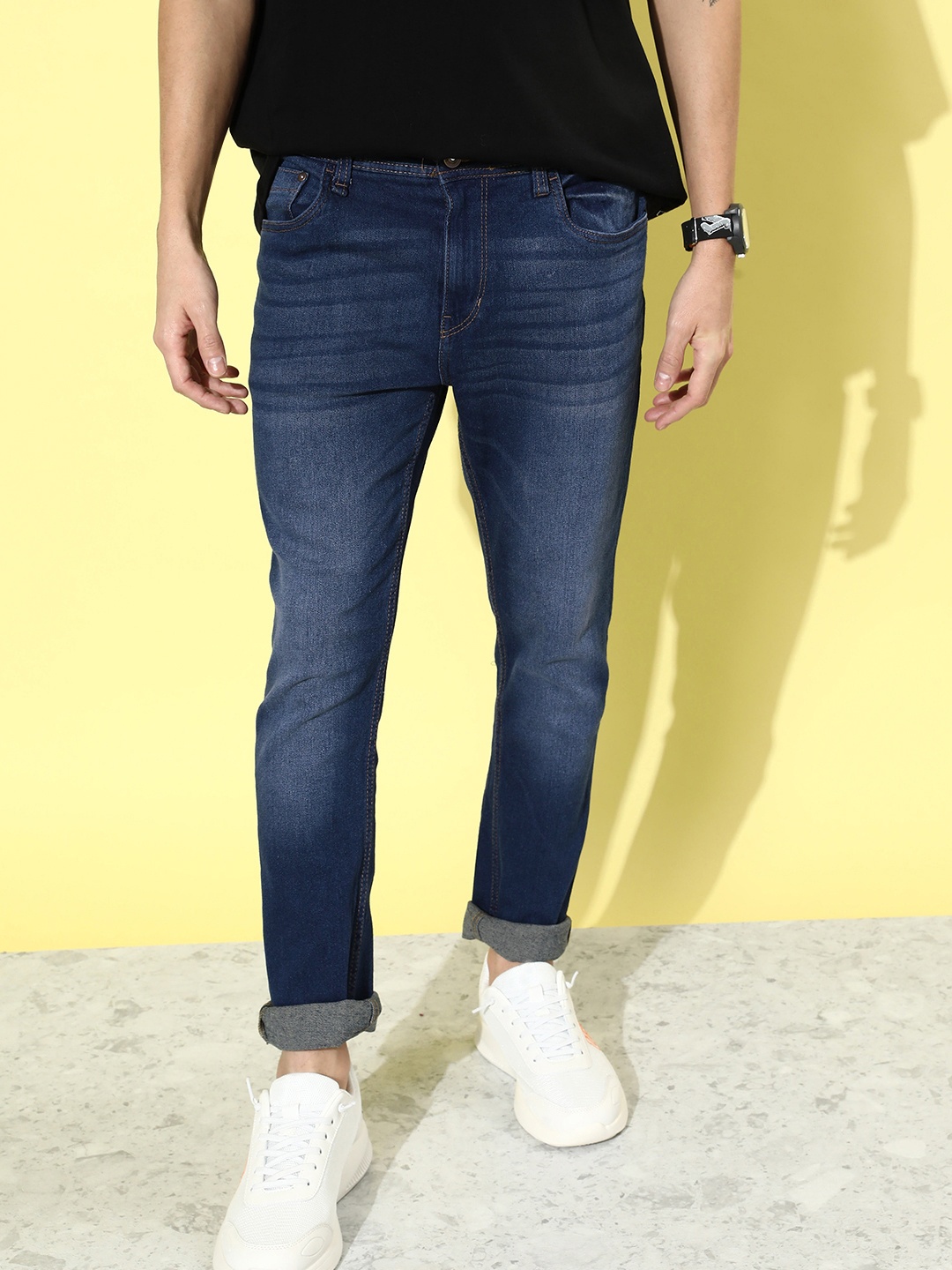 

The Roadster Lifestyle Co. Men Blue Slim Fit Mid Rise Light Fade Stretchable Jeans