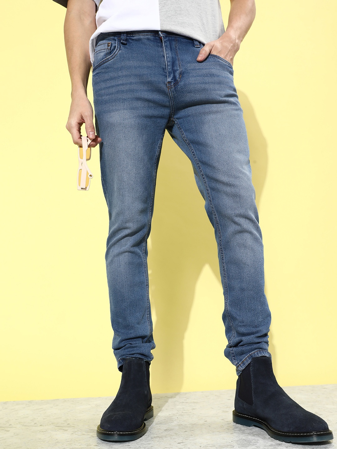 

The Roadster Lifestyle Co. Men Blue Slim Fit Mid Rise Light Fade Stretchable Jeans