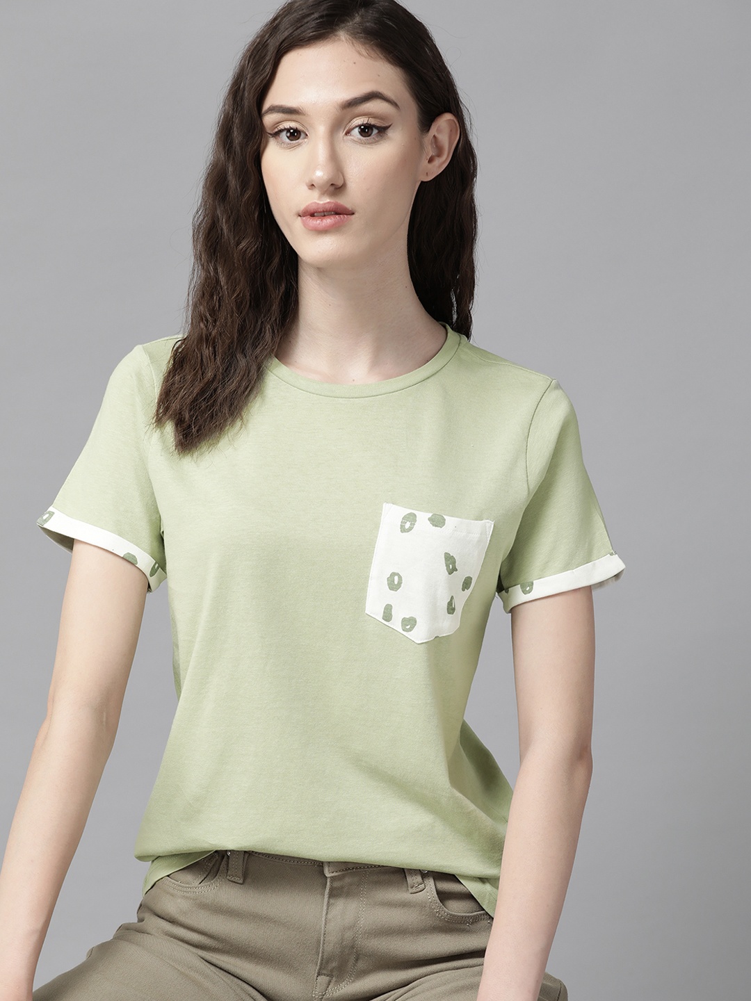 

The Roadster Lifestyle Co. Women Sage Green Solid Pure Cotton T-shirt With Pocket