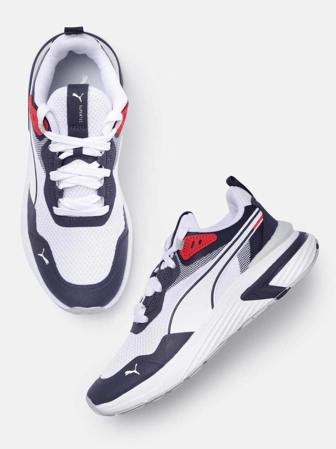

Puma Men White & Blue Solid Soft Foam+ Supertec Regular Training Shoes