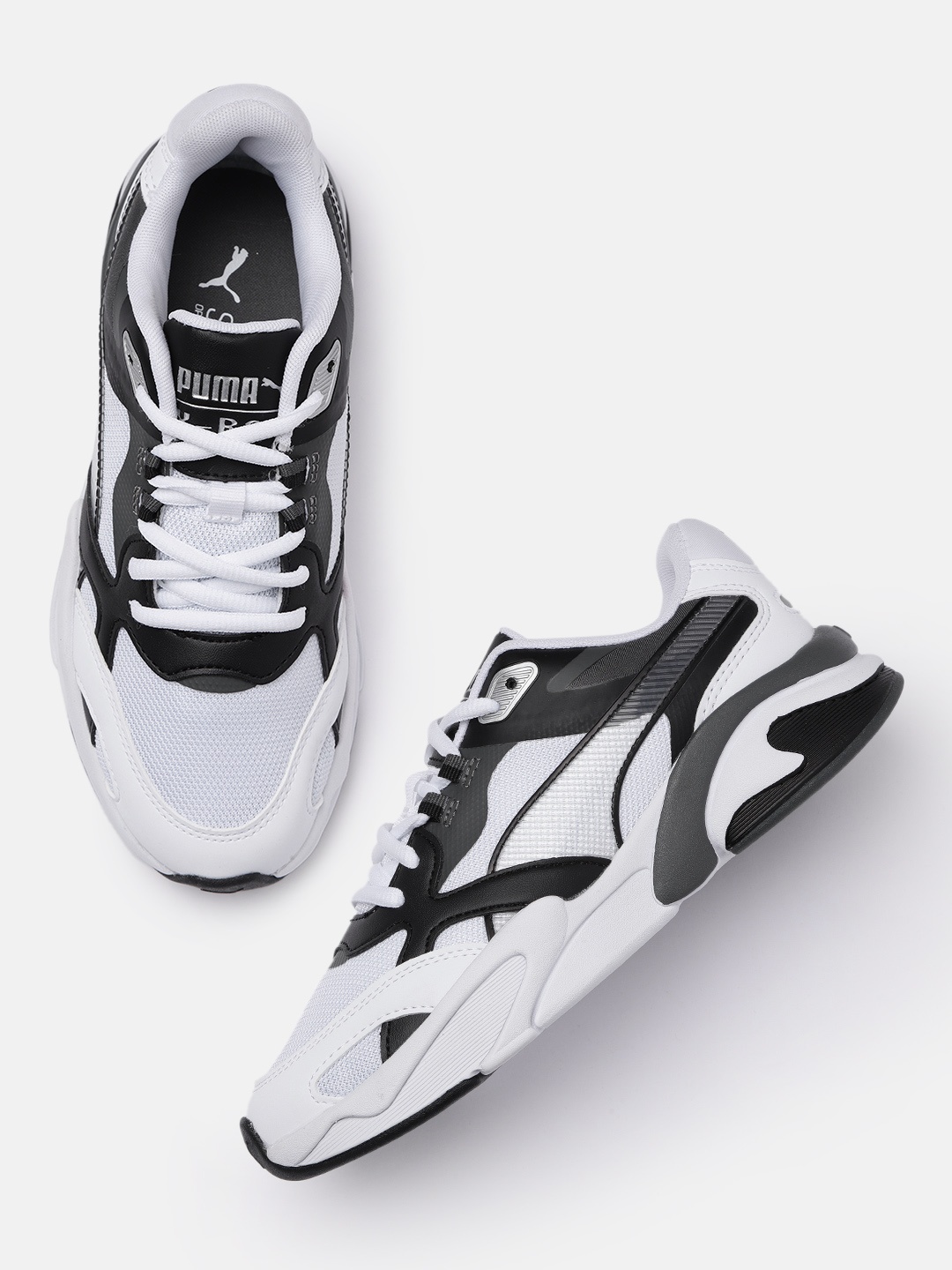 

Puma Unisex White & Black Solid IMEVA X-Ray Lite Millenium Regular Sneakers