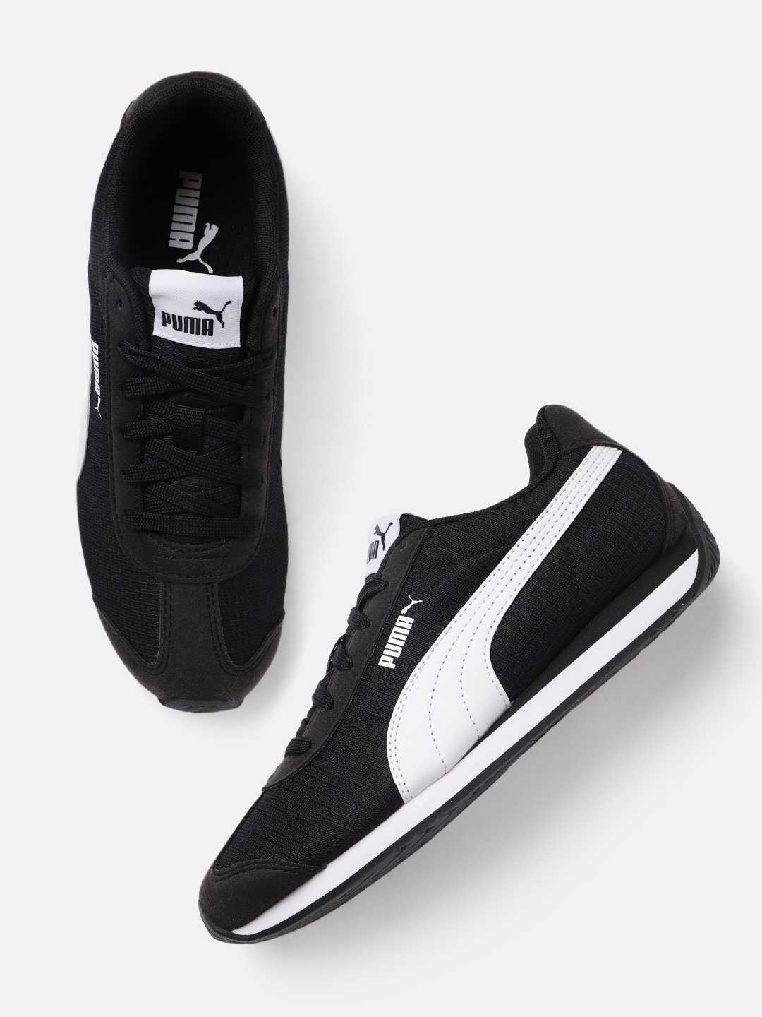 

Puma Unisex Black Solid Sneakers