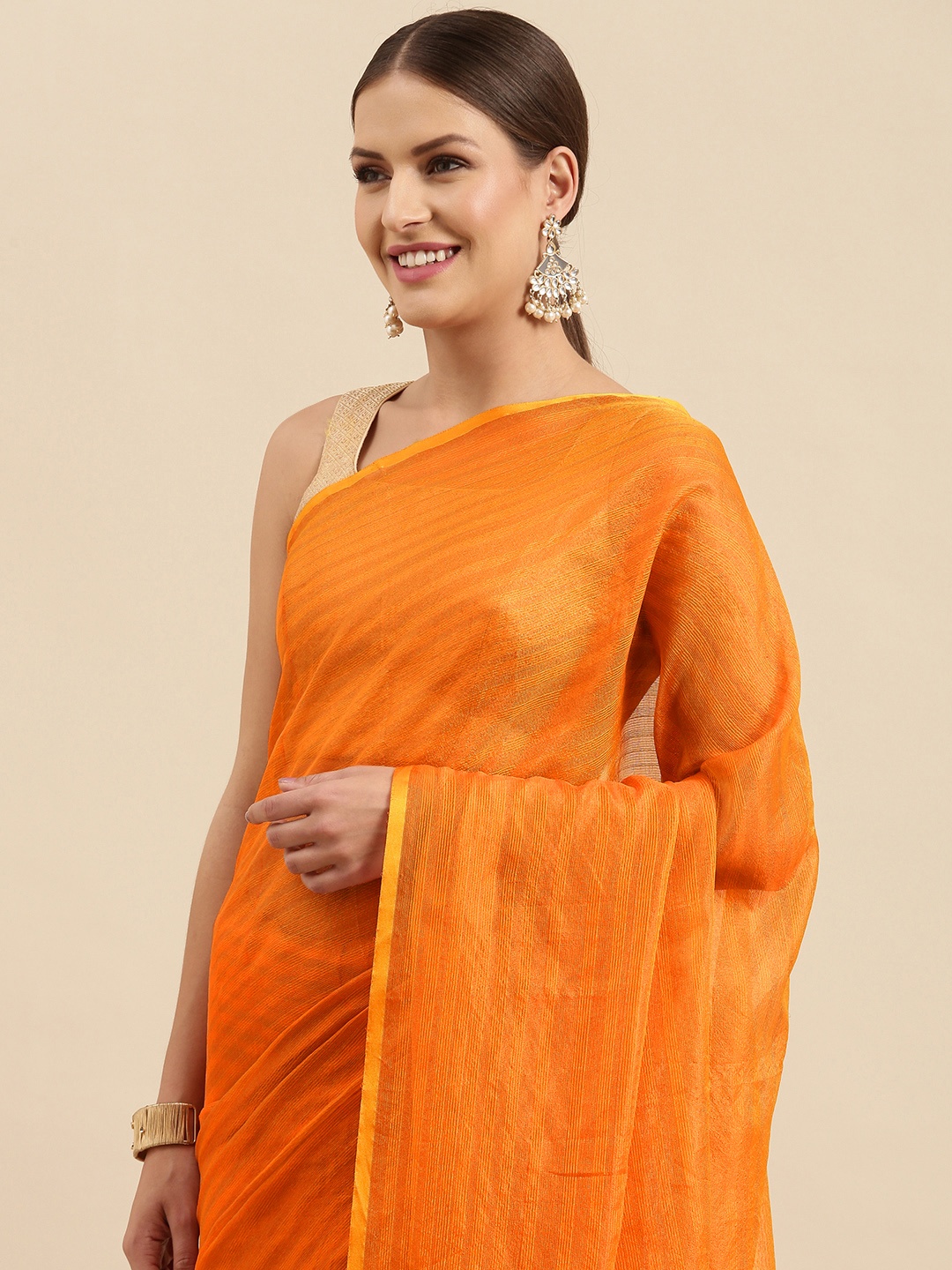 

Anouk Orange Self Striped Silk Blend Banarasi Saree