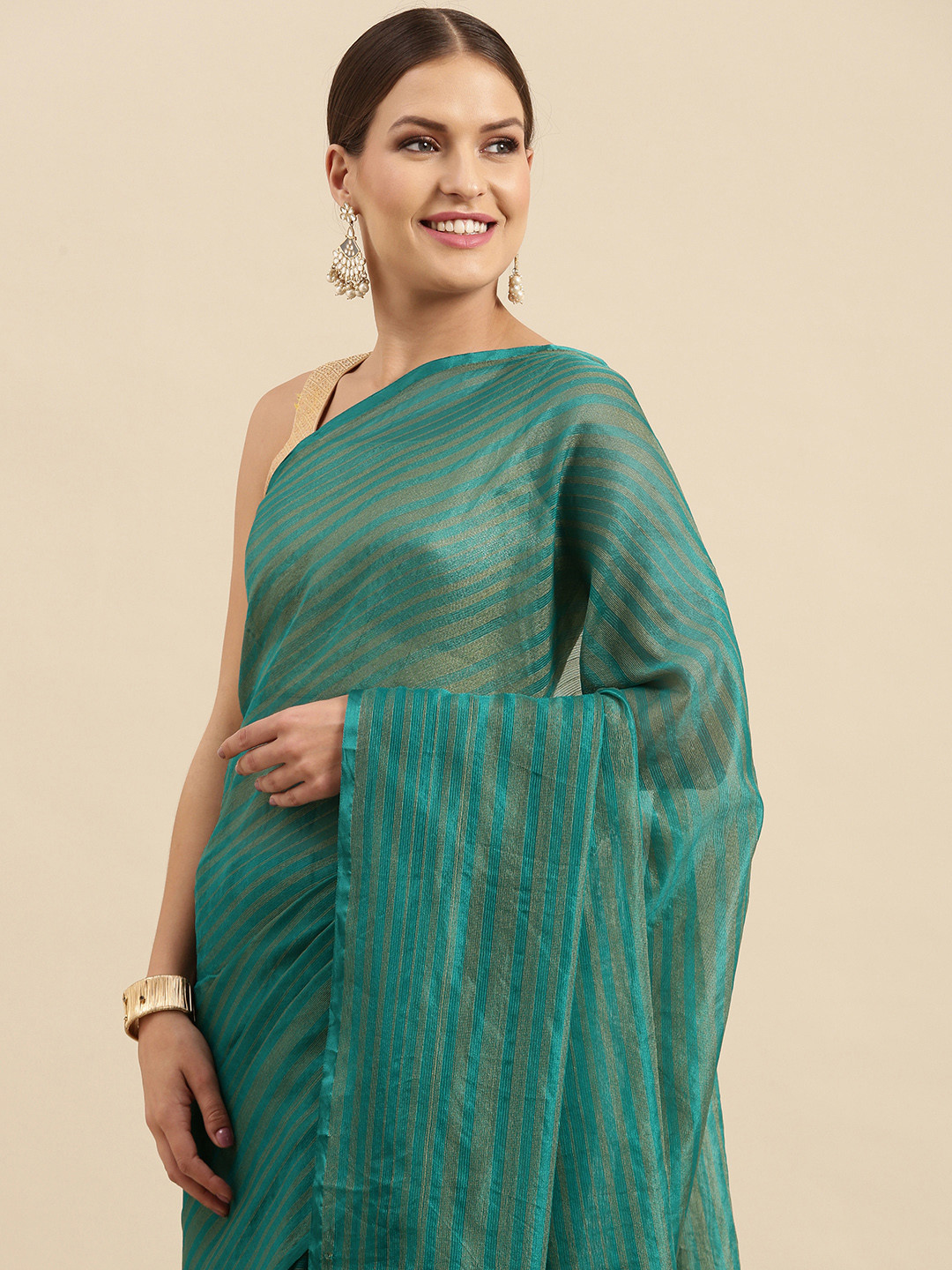 

Anouk Teal Self Striped Silk Blend Banarasi Saree
