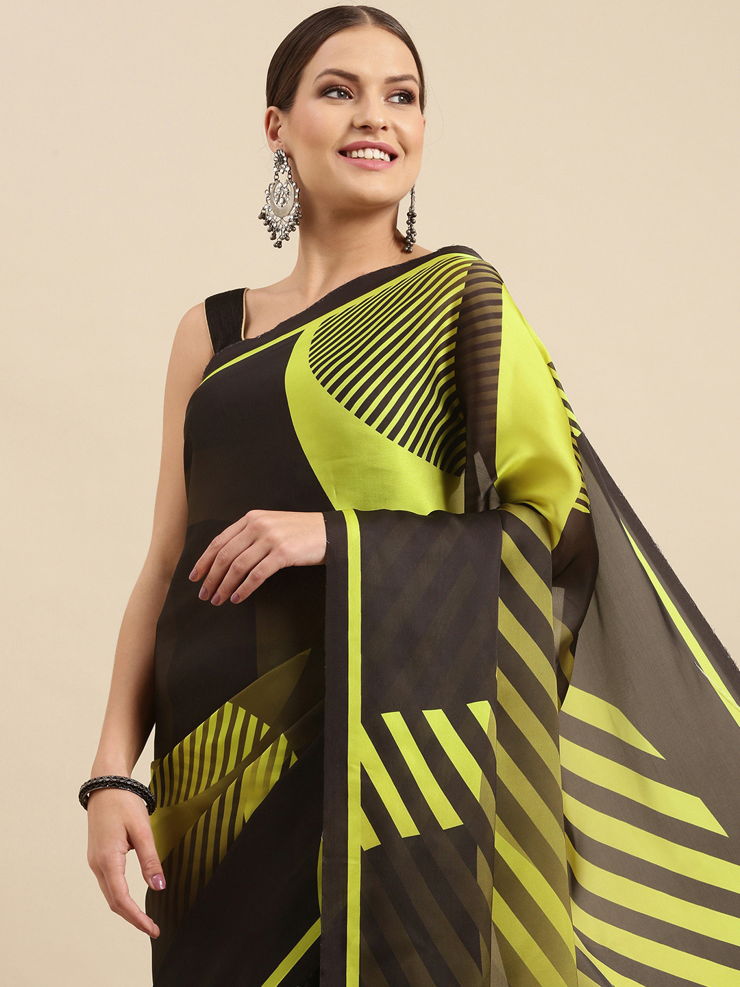 

Anouk Women Brown & Yellow Striped Saree