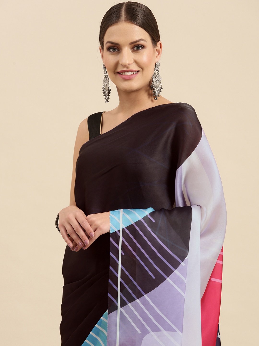 

Anouk Women Black & Blue Striped Saree