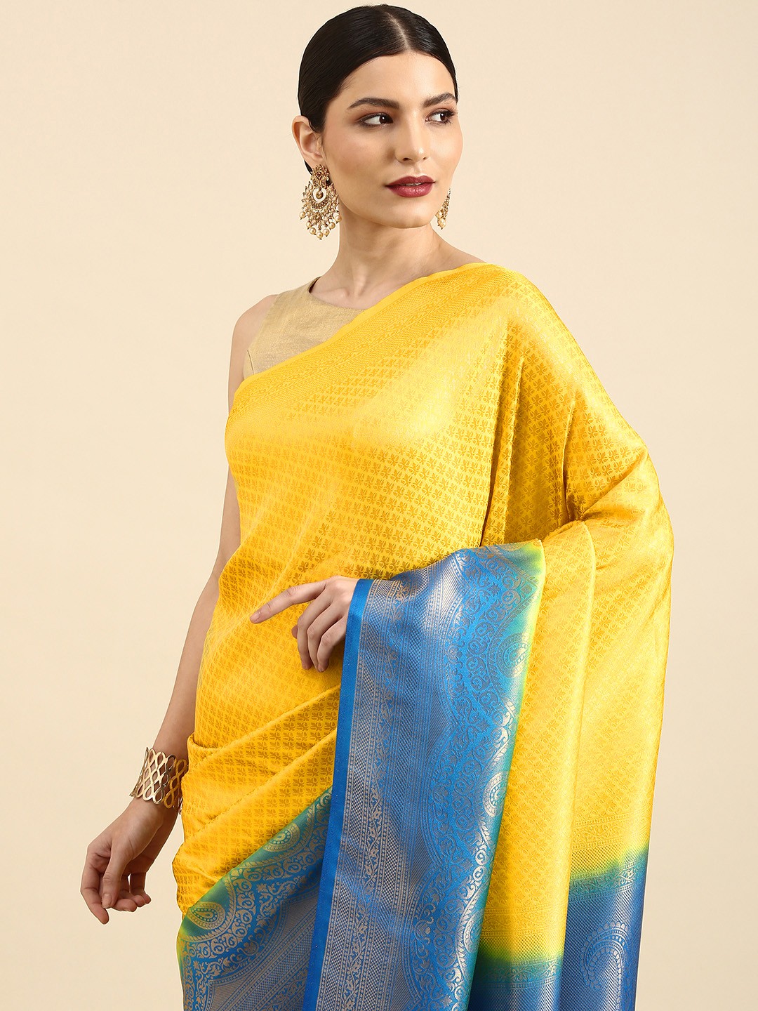 

Anouk Yellow & Blue Ethnic Motifs Silk Blend Banarasi Saree