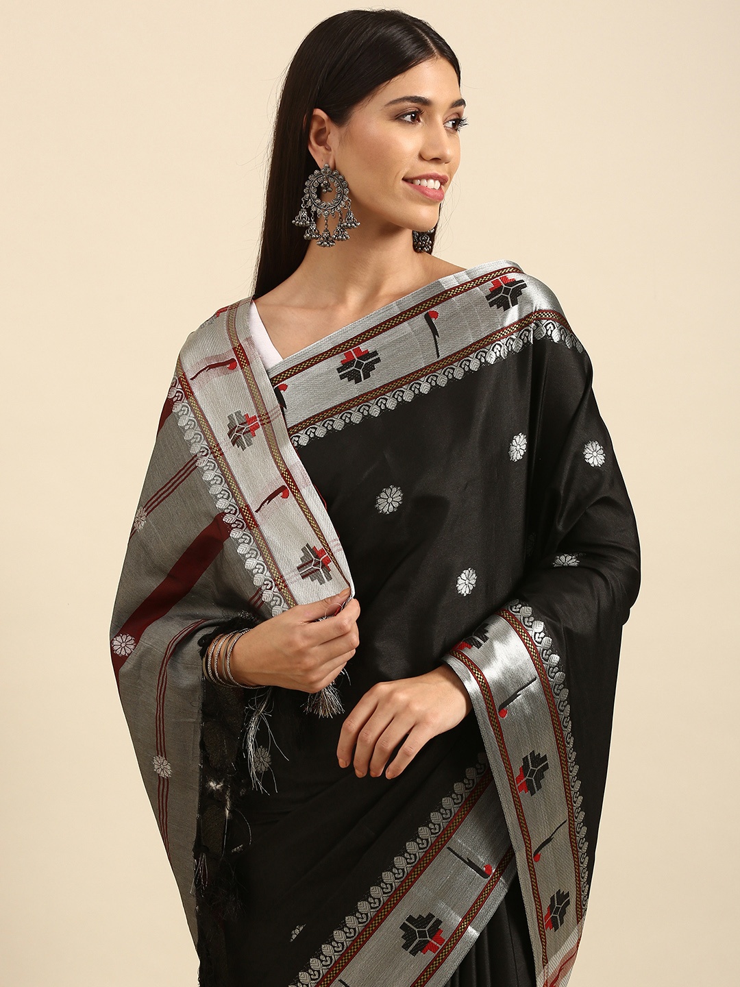 

Anouk Black & Silver-Toned Ethnic Motifs Zari Silk Blend Banarasi Saree