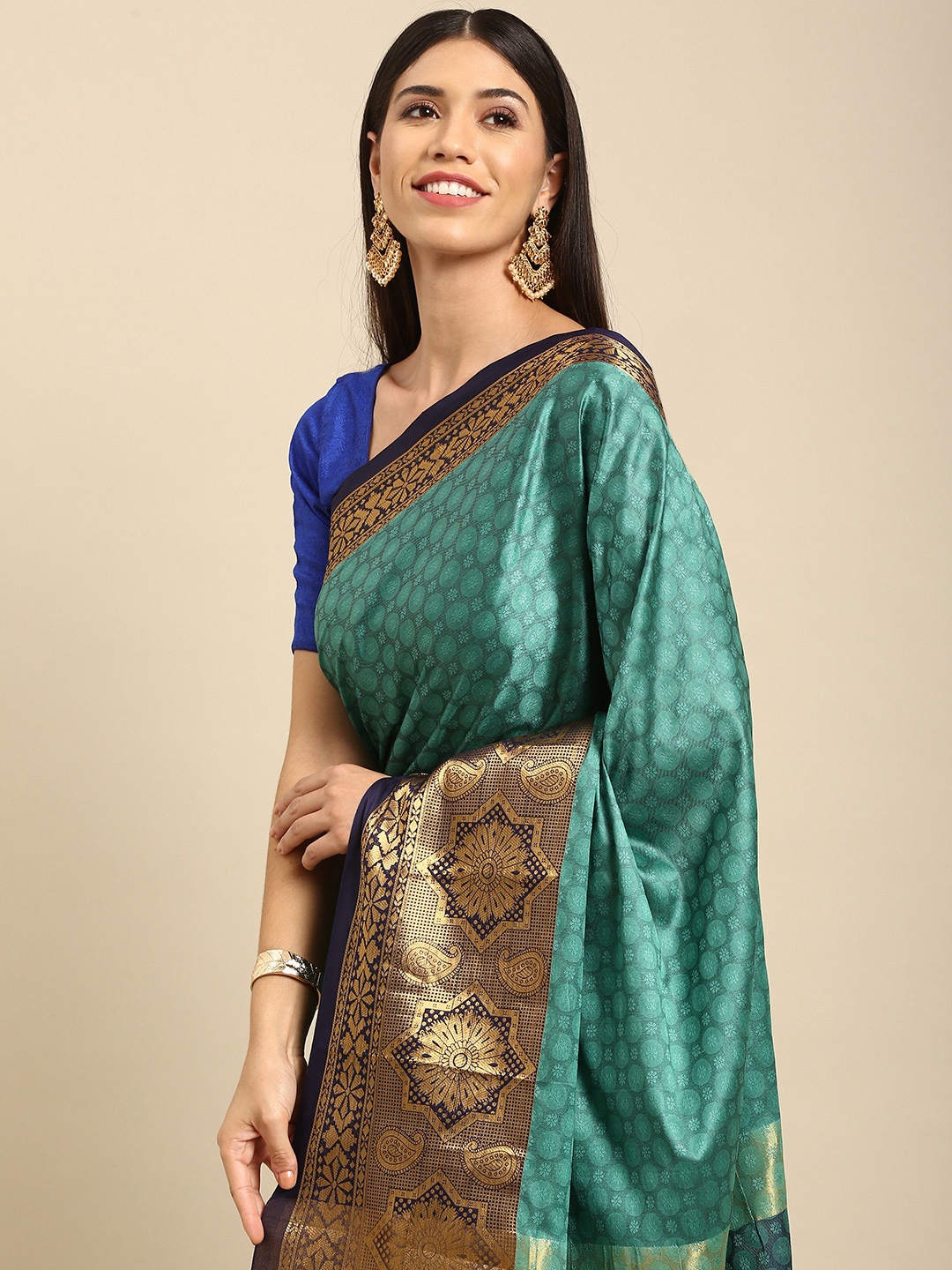 

Anouk Sea Green & Gold-Toned Ethnic Motifs Woven Design Silk Blend Banarasi Saree