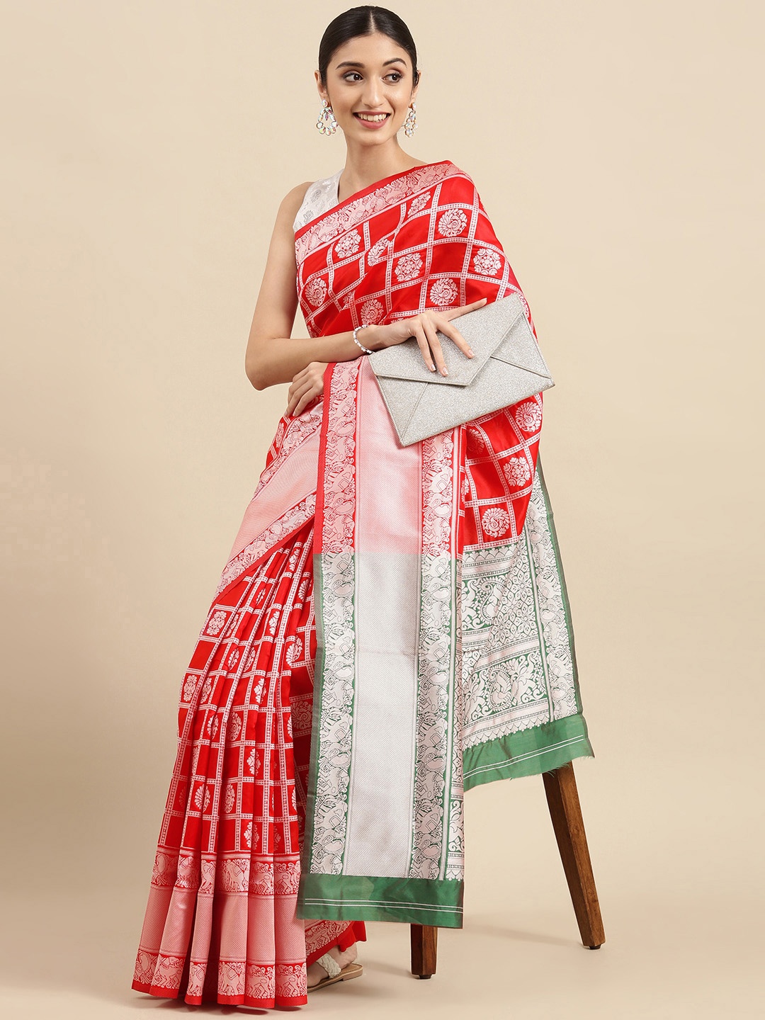 

Anouk Red & Silver-Toned Ethnic Motifs Zari Pure Silk Celebrity Patola Saree