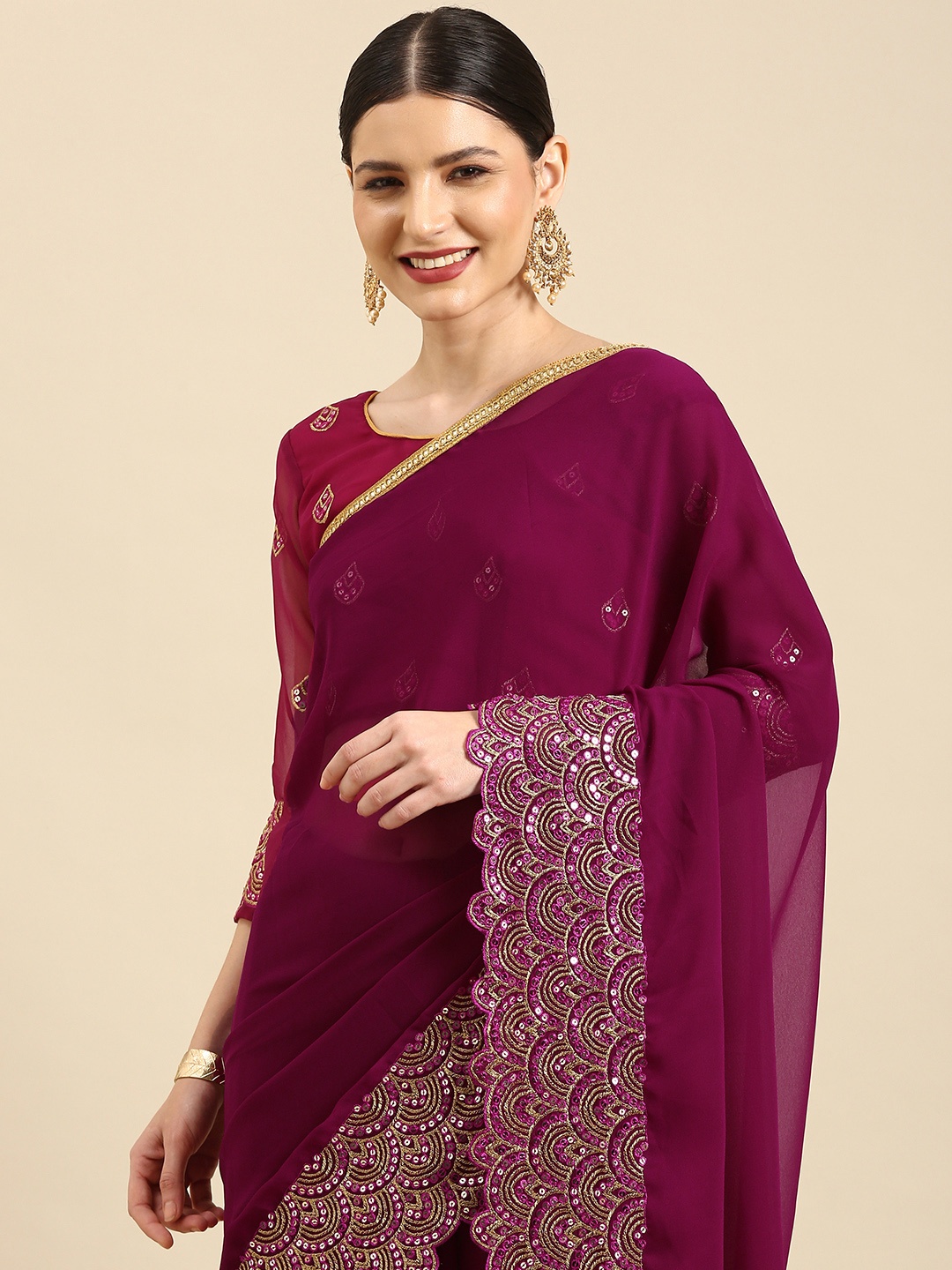 

Anouk Burgundy & Gold Embellished Sequinned Pure Georgette Celebrity Saree
