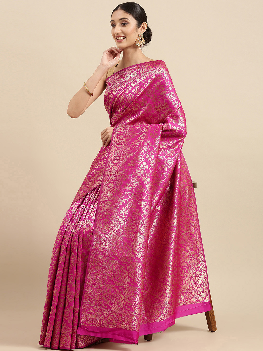 

Anouk Pink & Gold-Toned Ethnic Motifs Zari Pure Silk Celebrity Saree