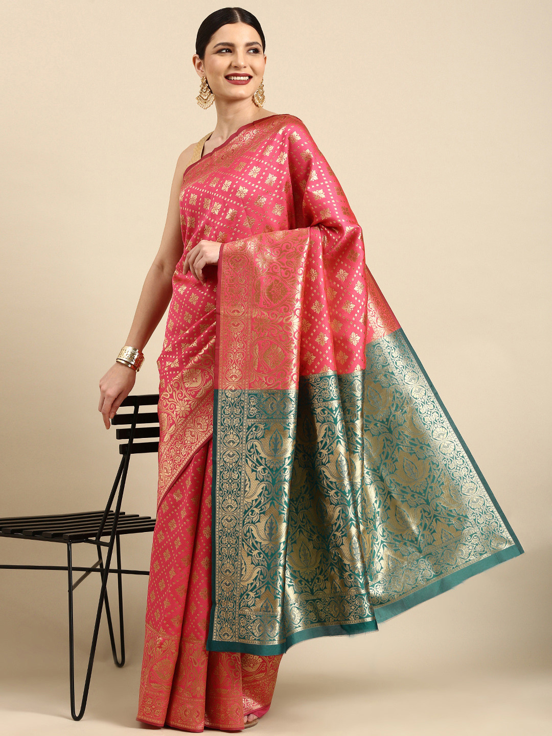 

Anouk Pink & Gold Ethnic Motifs Zari Pure Silk Celebrity Saree