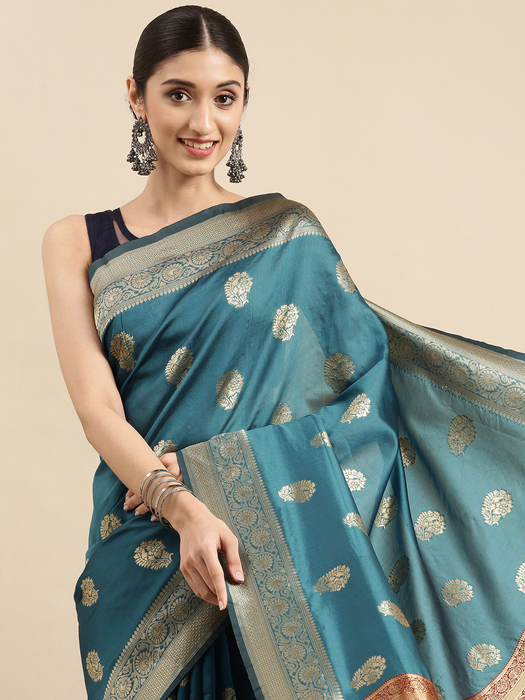 

Anouk Teal Blue & Gold Ethnic Motifs Zari Pure Silk Celebrity Banarasi Saree