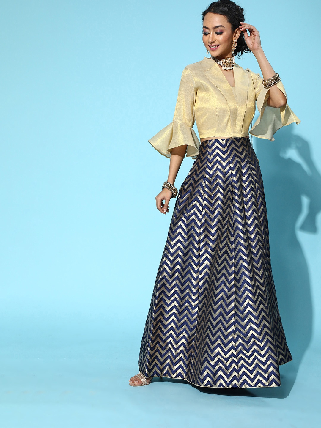 

mokshi Women Stunning Gold Solid Top with Self-Design Skirt