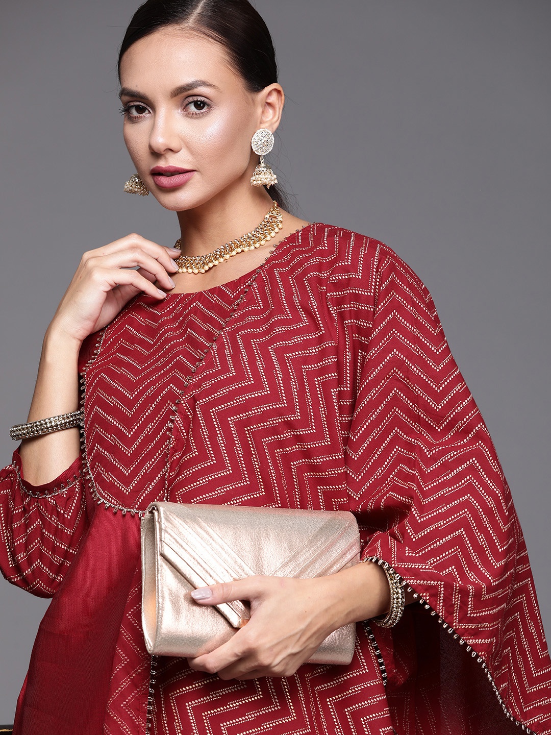 

Indo Era Women Red Yoke Design Kurta with Palazzos & With Dupatta