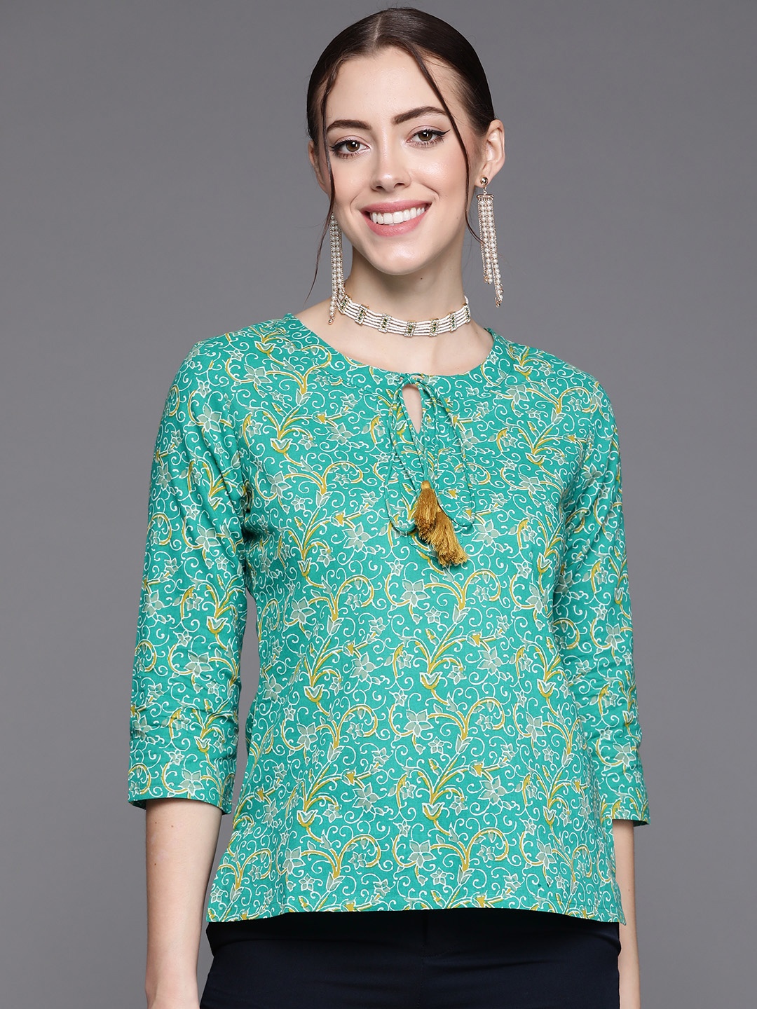 

Indo Era Sea Green Floral Print Tie-Up Neck Top