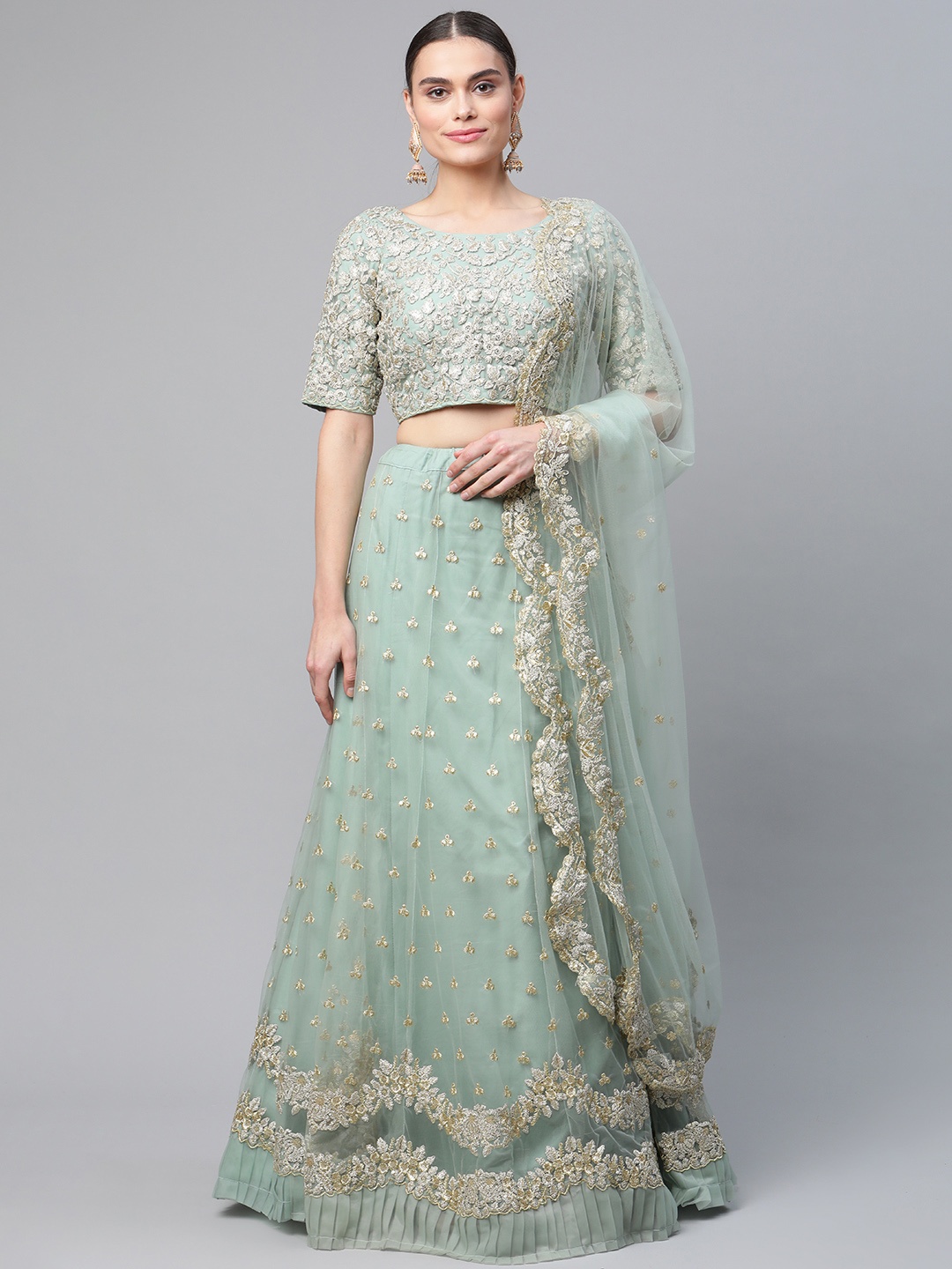 

Readiprint Fashions Green & Gold-Toned Semi-Stitched Lehenga & Unstitched Blouse