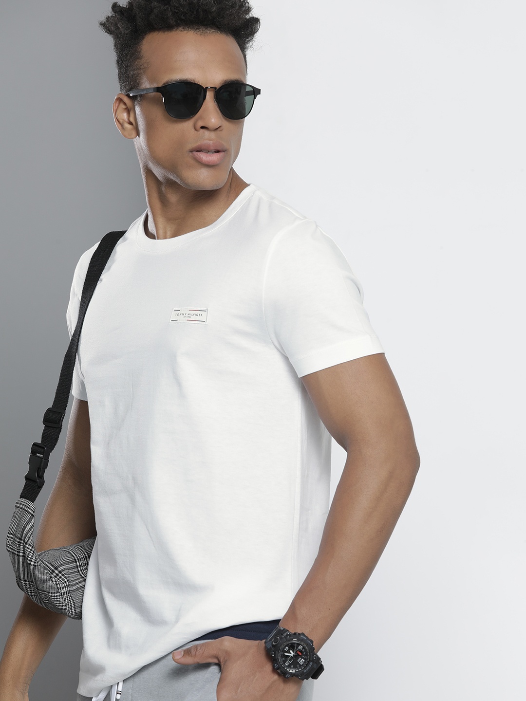 

Tommy Hilfiger Men White Solid Pure Cotton Applique T-shirt