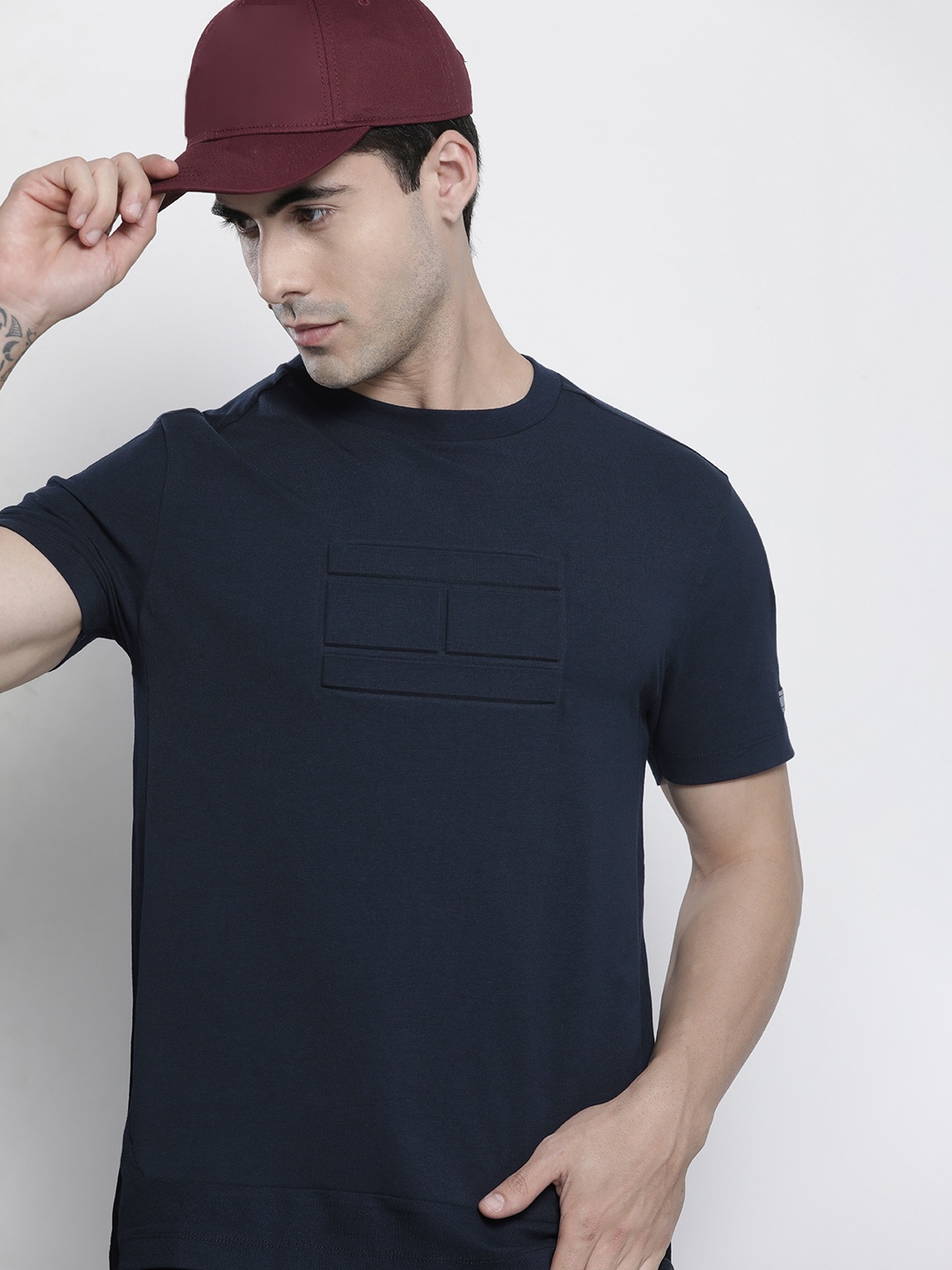 

Tommy Hilfiger Men Navy Blue Solid T-shirt