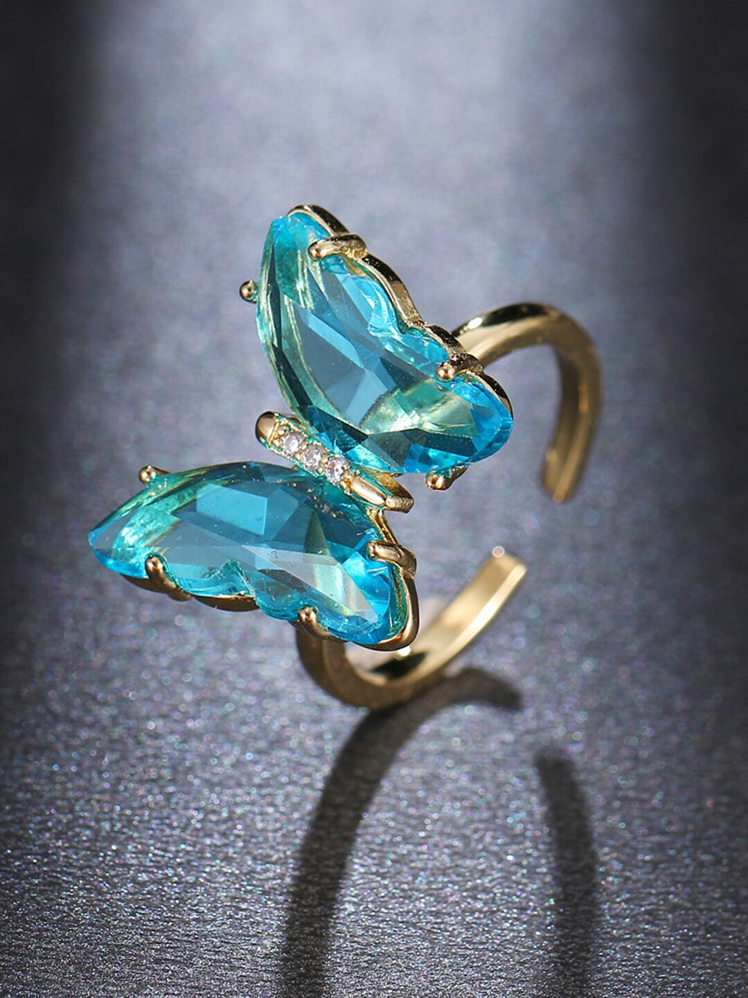 

Vembley Women Gold Plated & Blue Crystal Butterfly Ring