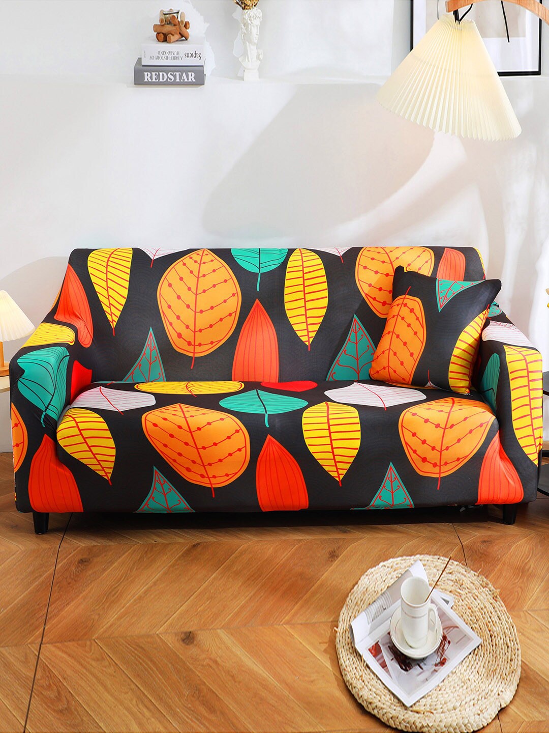 

HOUSE OF QUIRK Black & Orange Printed 1-Seater Stretchable Non-Slip Sofa Slipcover