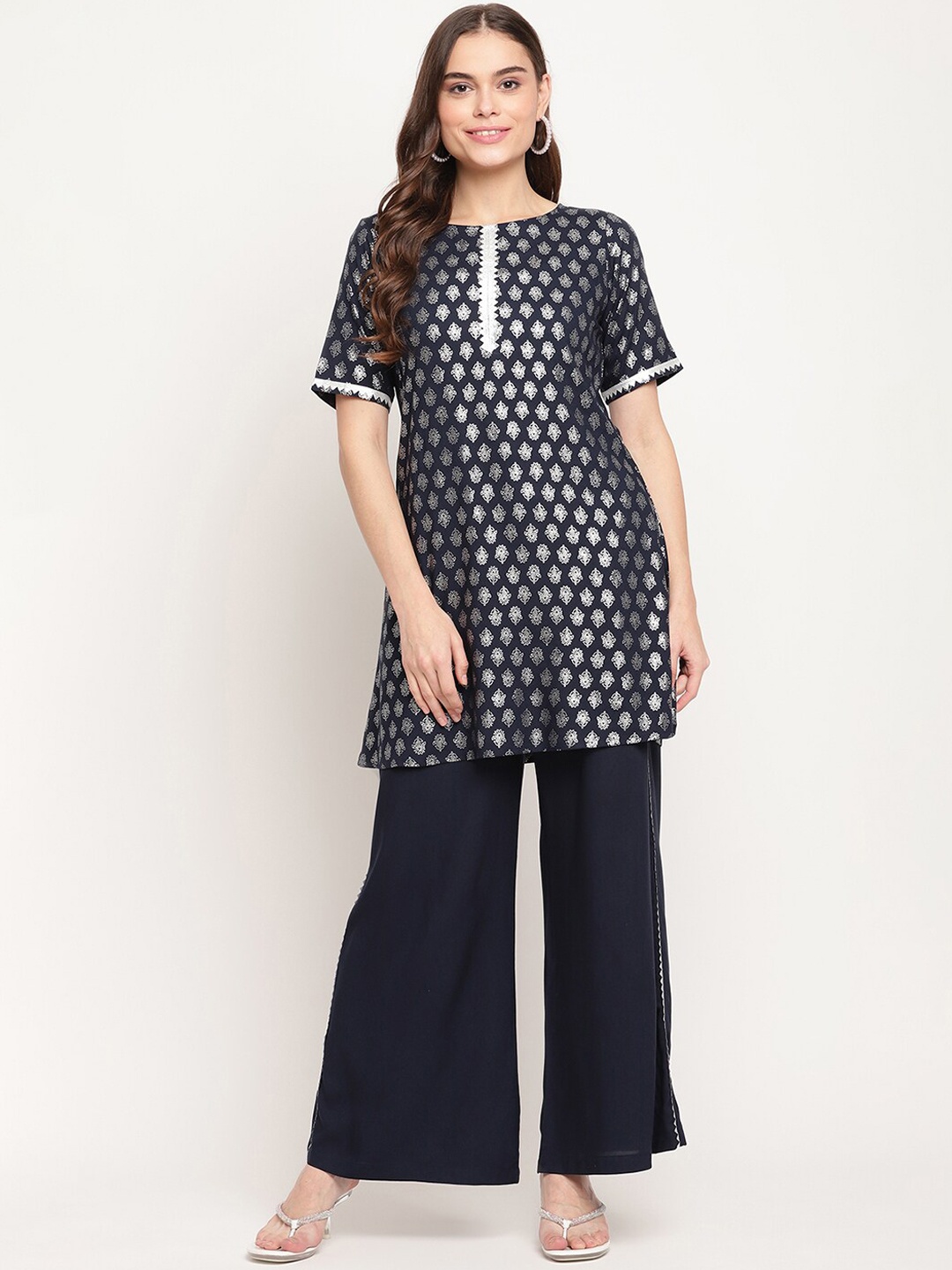 

Ahalyaa Women Blue Ethnic Motifs Printed Gotta Patti Kurti with Palazzos