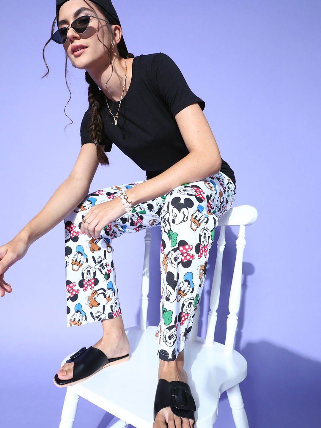 

Kook N Keech Disney Women Stunning Black Solid T-Shirt With Printed Trousers
