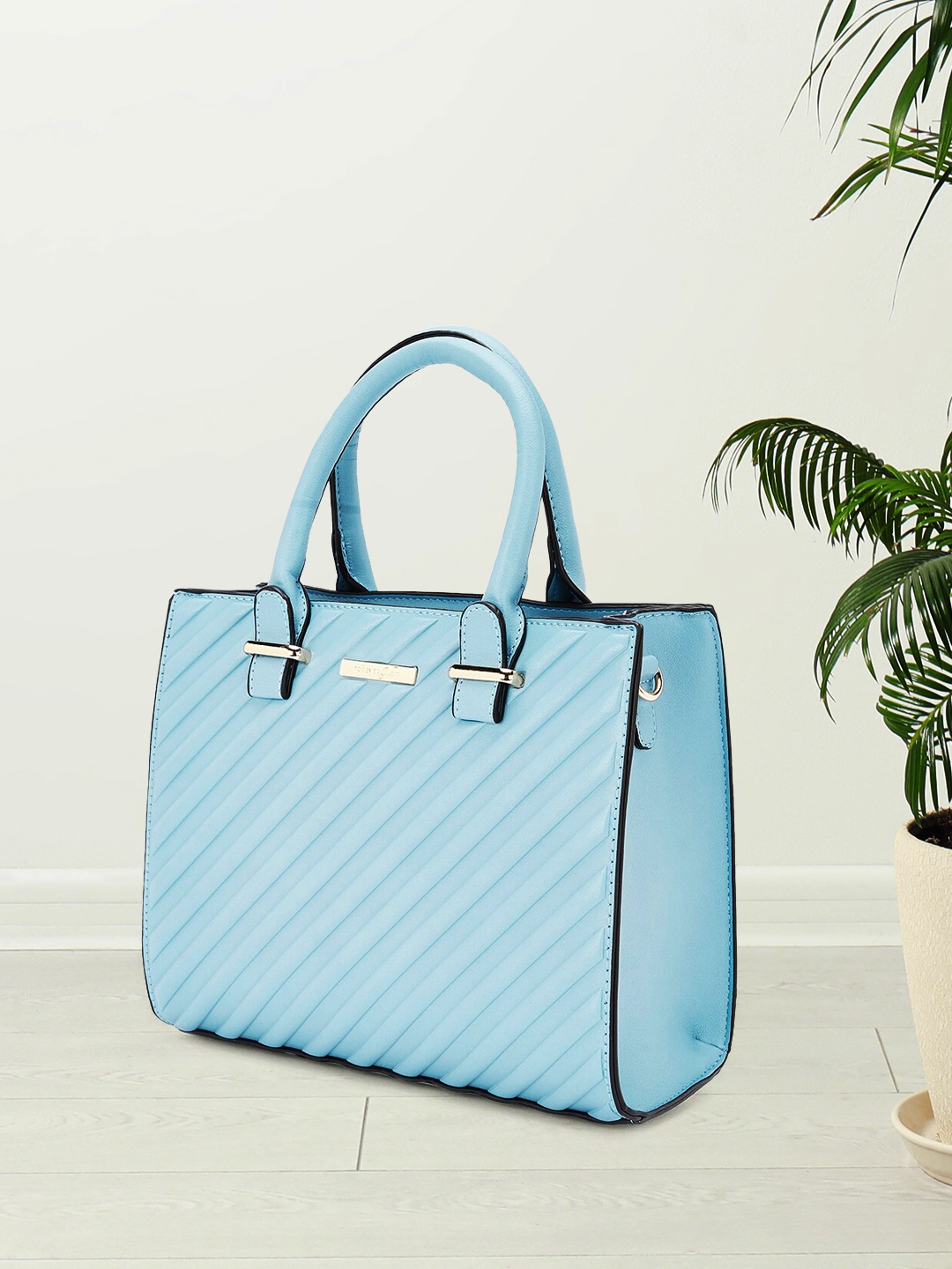 

Forever Glam by Pantaloons Blue Structured Handheld Bag with Quilted