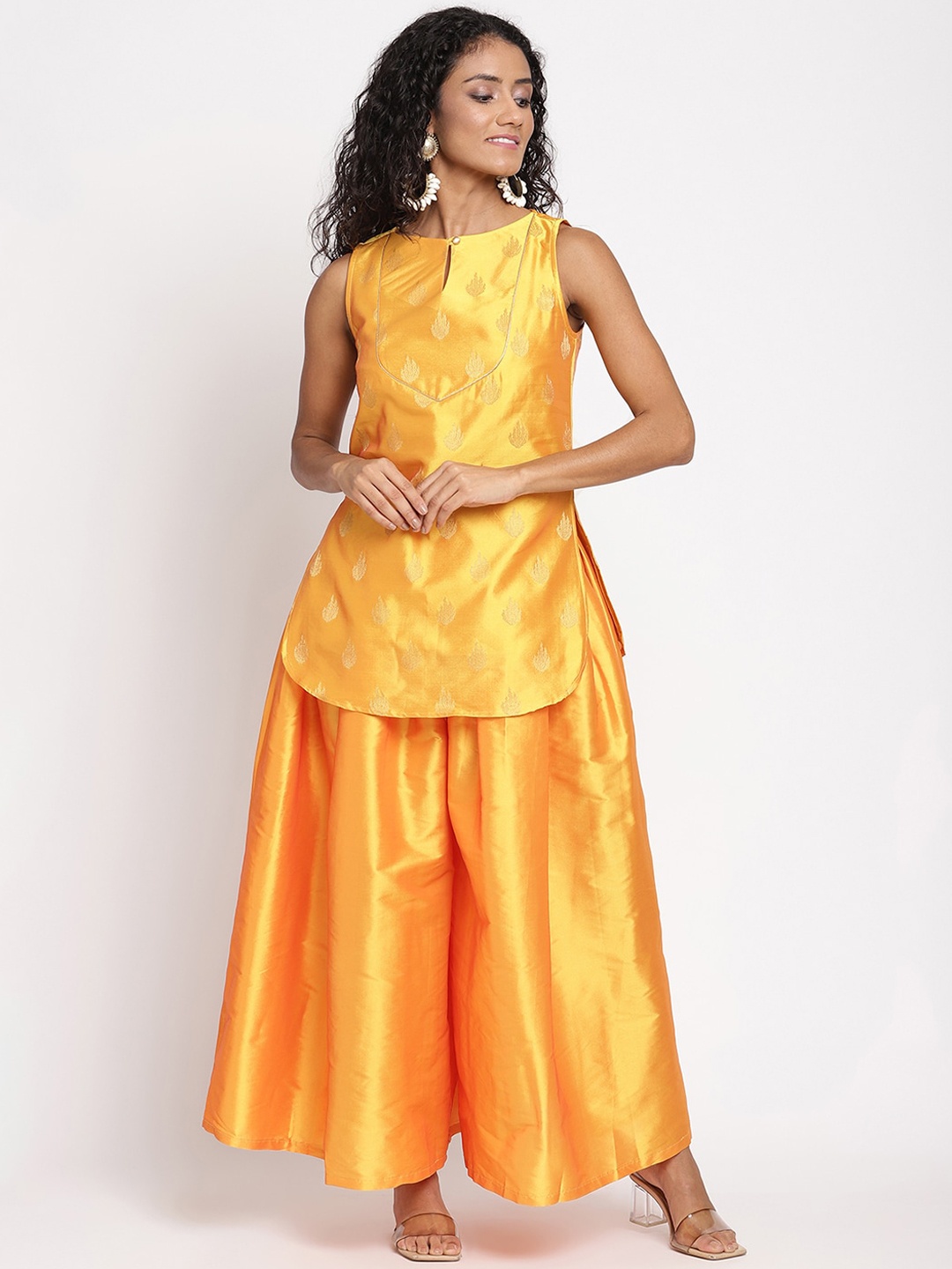 

Abhishti Women Orange Ethnic Motifs Kurti with Palazzos
