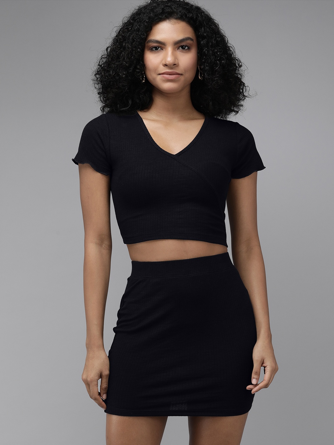 

The Roadster Lifestyle Co Black Ribbed Top With Skirt