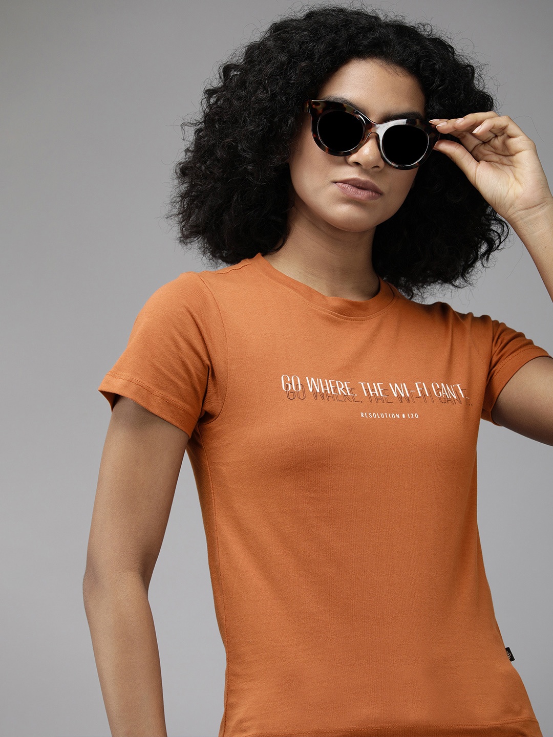 

The Roadster Lifestyle Co Women Brown & White Printed Pure Cotton T-shirt