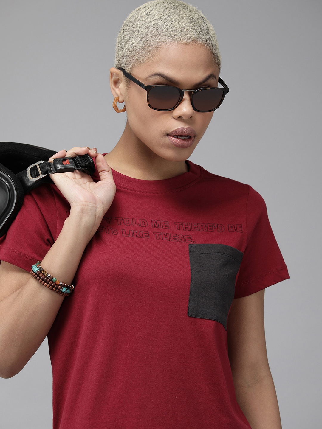 

The Roadster Lifestyle Co Women Red Printed Pure Cotton T-shirt with Pocket Detailing