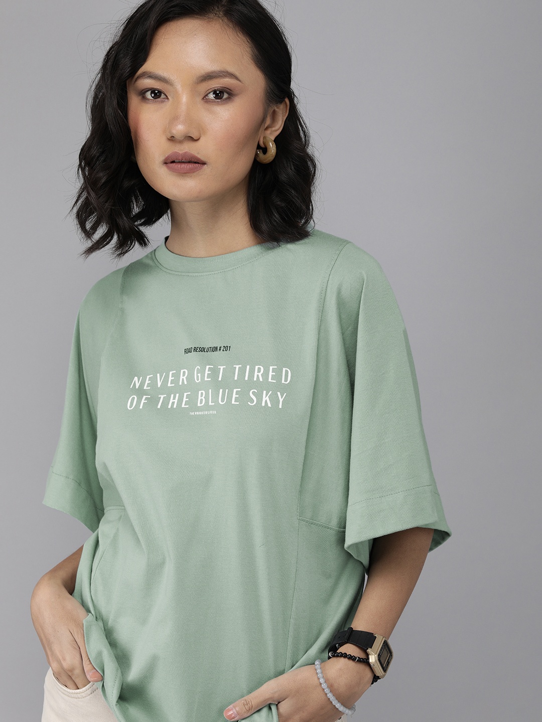 

The Roadster Lifestyle Co Women Green & White Printed Drop-Shoulder Sleeves T-shirt