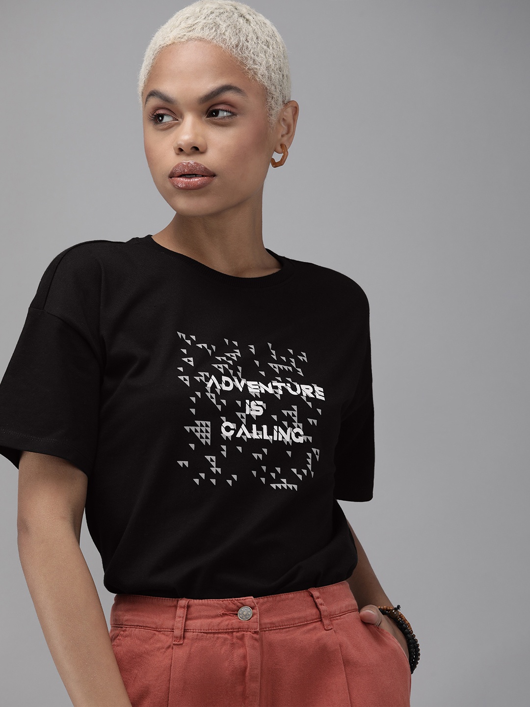 

The Roadster Lifestyle Co Women Black Graphic Printed Extended Sleeves Pure Cotton T-shirt