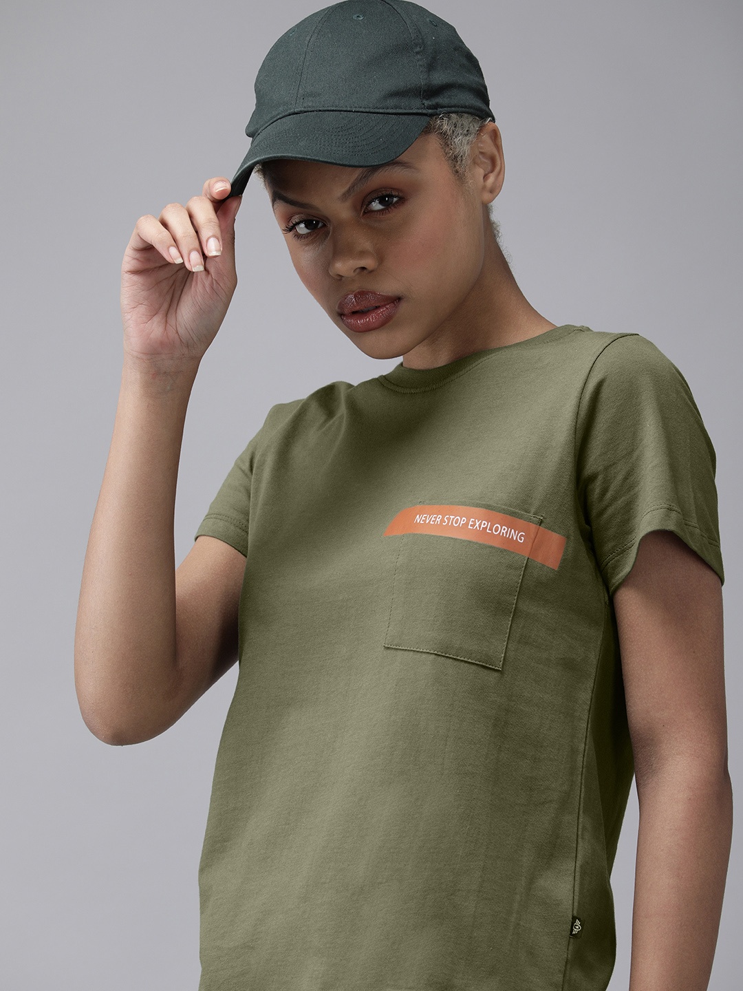 

The Roadster Lifestyle Co Women Olive Green Solid Pure Cotton T-shirt With Printed Pocket
